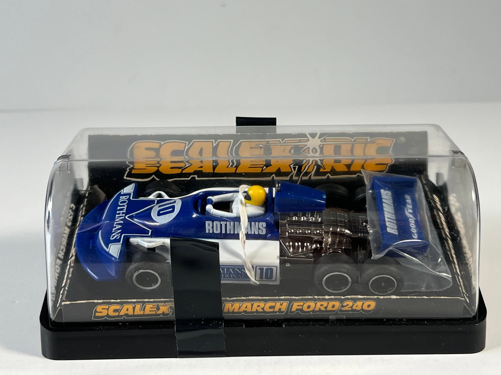 Scalextric March Ford 240 #10: Scalextric March Ford 240 #10 Rothmans 1/32 Slot Car. Reference #C129, with original case. Weight: 8 oz.