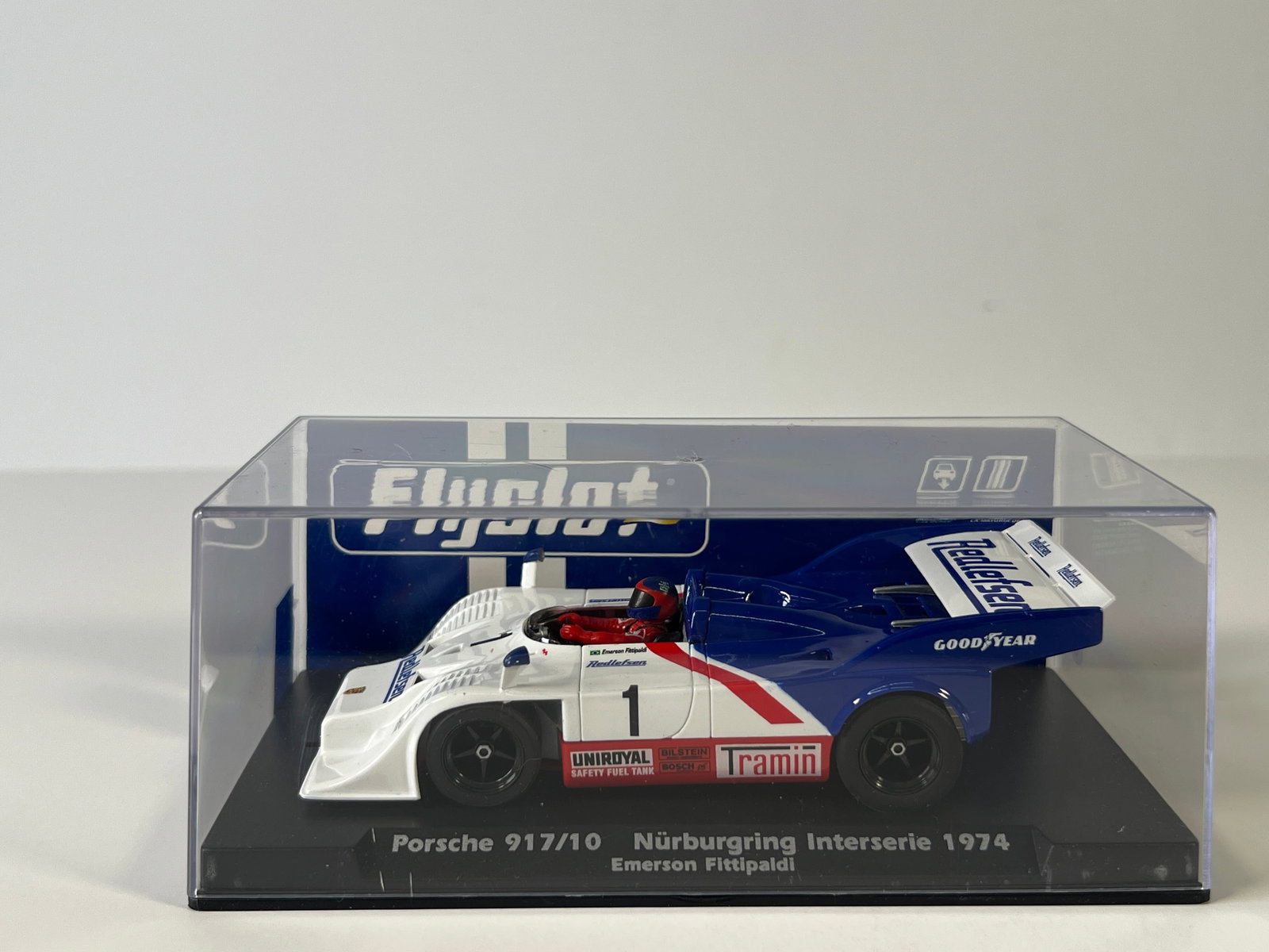 Flyslot Porsche 917/10 Nürburgring 1974 Emerson Fittipaldi #1: Flyslot Porsche 917/10 Nürburgring Interserie 1974 Emerson Fittipaldi #1 Redlefsen 1/32 Slot Car. Reference #019101, with original case. Weight: 6 oz.