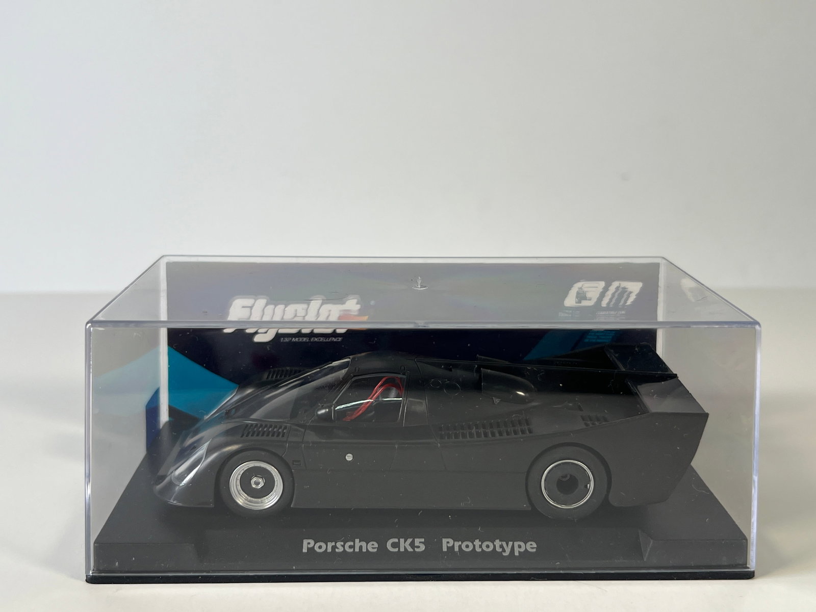 Flyslot Porsche Kremer CK5 Prototype: Flyslot Porsche Kremer CK5 Prototype 1/32 Slot Car. Reference #060301, with original case. Weight: 6 oz.