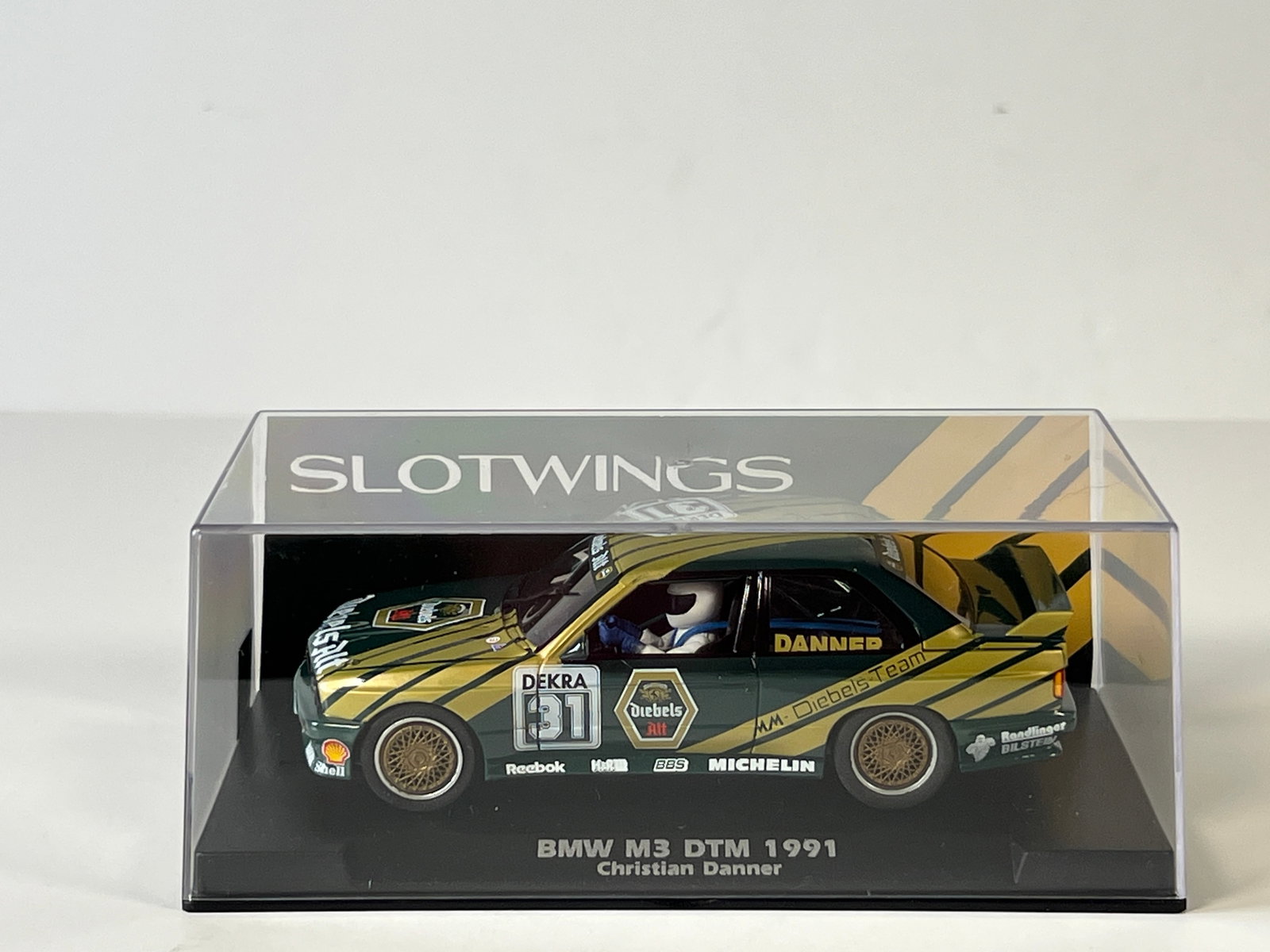 Slotwings BMW M3 DTM 1991 #31: Slotwings BMW M3 DTM 1991 Christian Danner #31 1/32 Slot Car. Reference #W038-04, with original case. Weight: 5 oz.