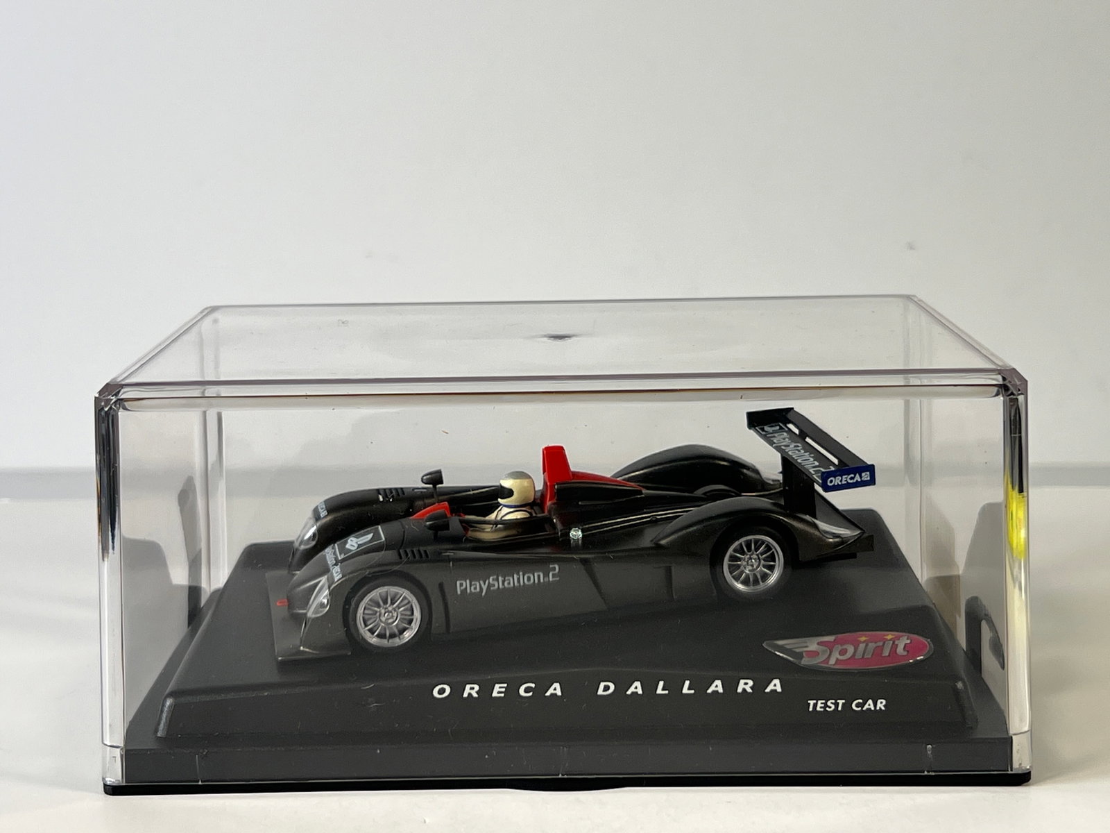 Spirit Oreca Dallara Test Car: Spirit Oreca Dallara Test Car PlayStation2 1/32 Slot Car. Reference #SPI401, with original case. Case measures 8 inches in length and weighs 10 oz.
