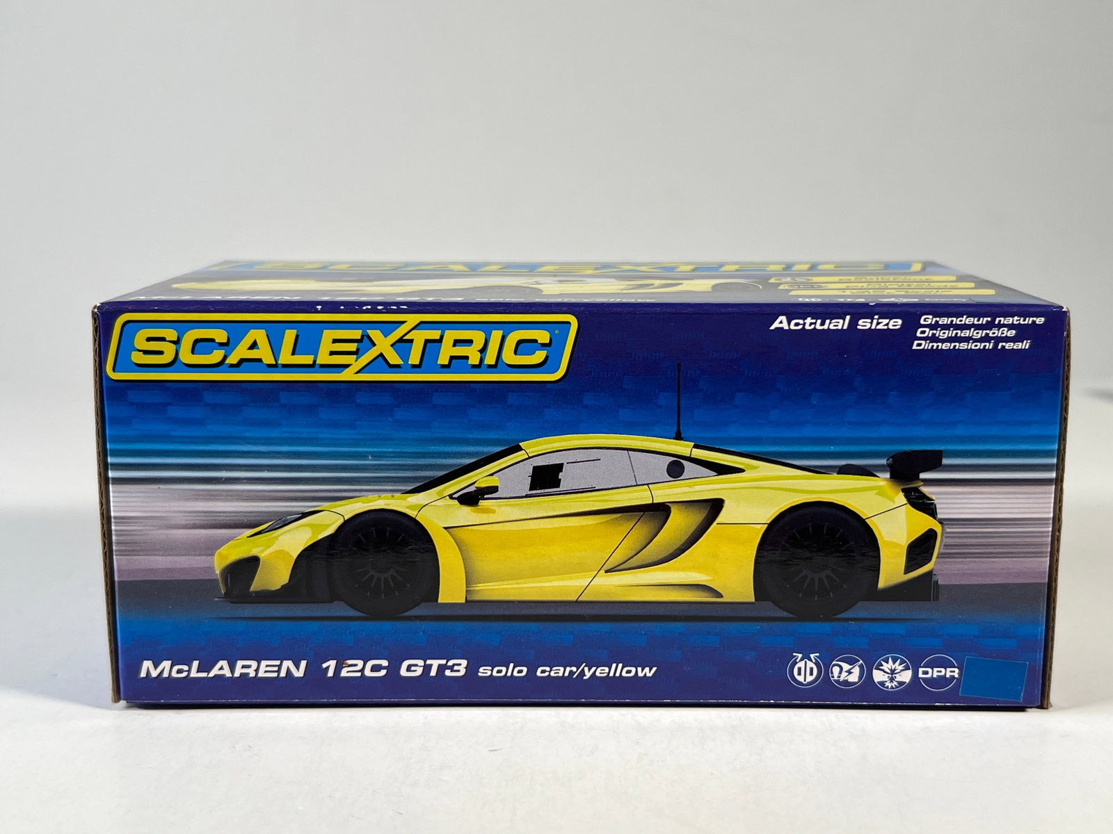 Scalextric McLaren 12C GT3: Scalextric McLaren 12C GT3 Yellow 1/32 Slot Car, with original case. Case length 6.5 inches. Weight: 5.4 oz. 