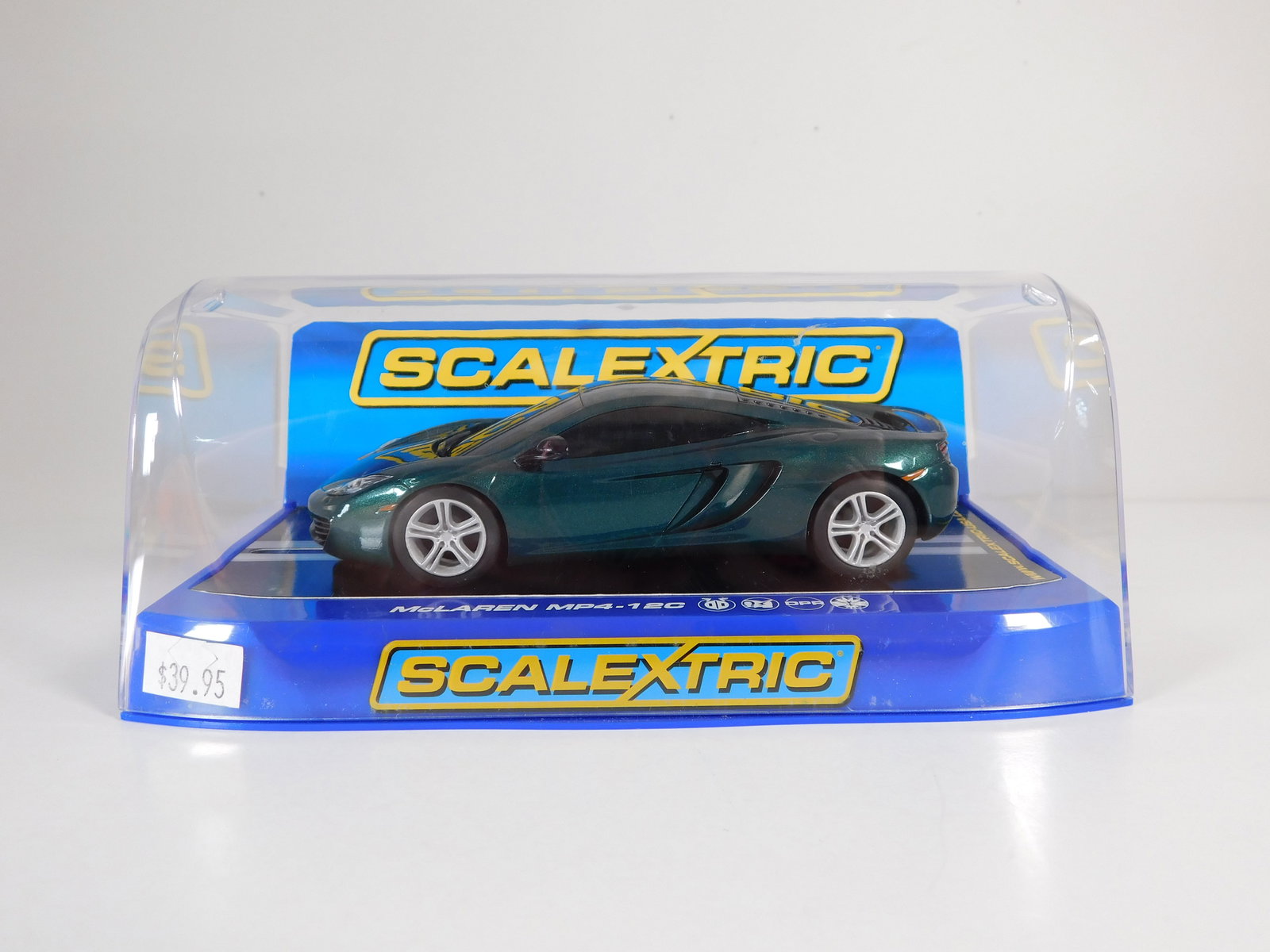 Scalextric McLaren MP4-12C: Scalextric McLaren MP4-12C 1/32 Slot Car. Reference #C3273, with original case. Weight: 8.1 oz.