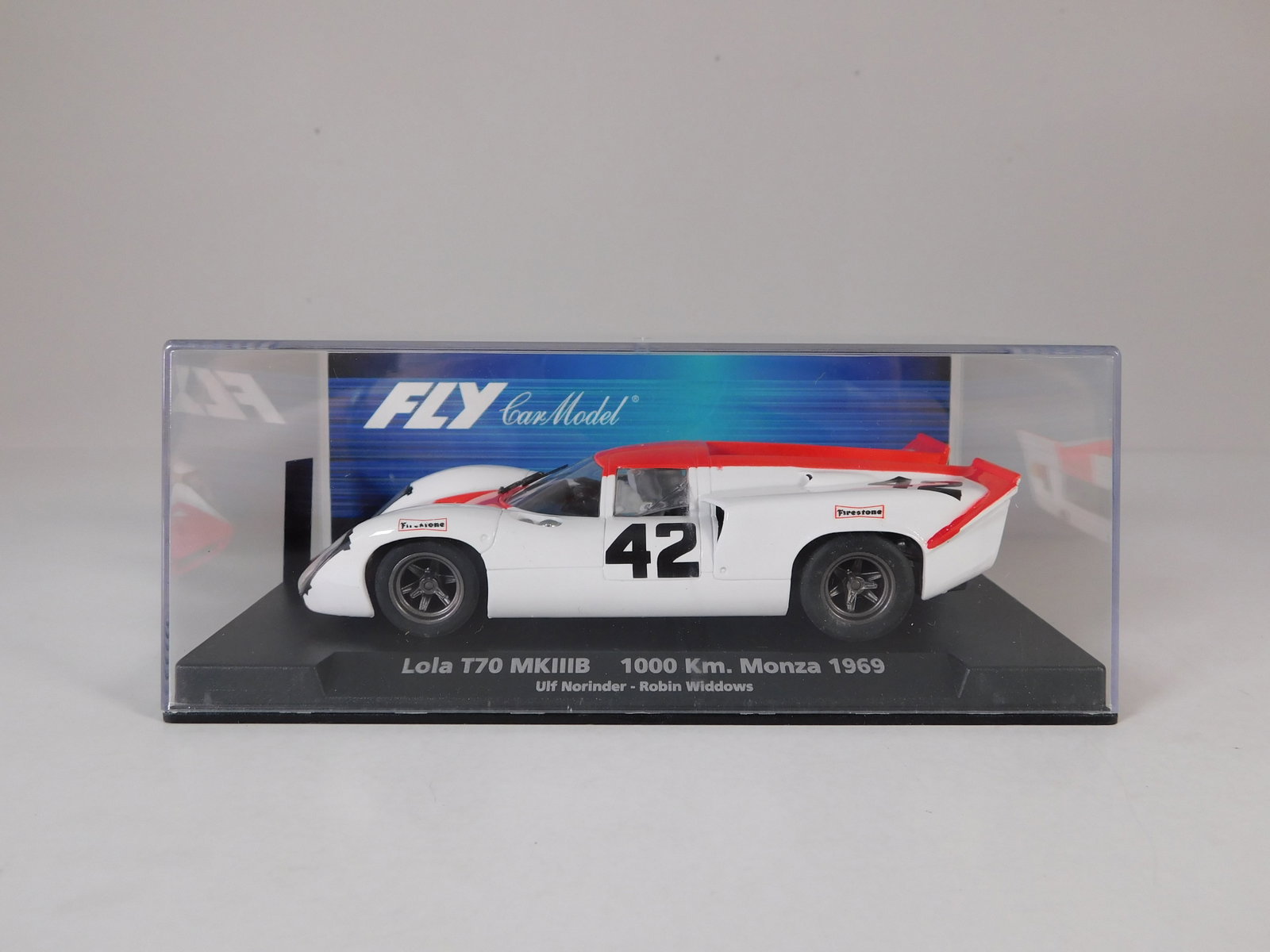 Fly Car Model Lola T70 MKIIIB 1000km Monza 1969 #42: Fly Car Model Lola T70 MKIIIB 1000km Monza 1969 Ulf Norinder - Robin Widdows #42 1/32 Slot Car. Reference #88062, with original case. Weight: 6.4 oz.