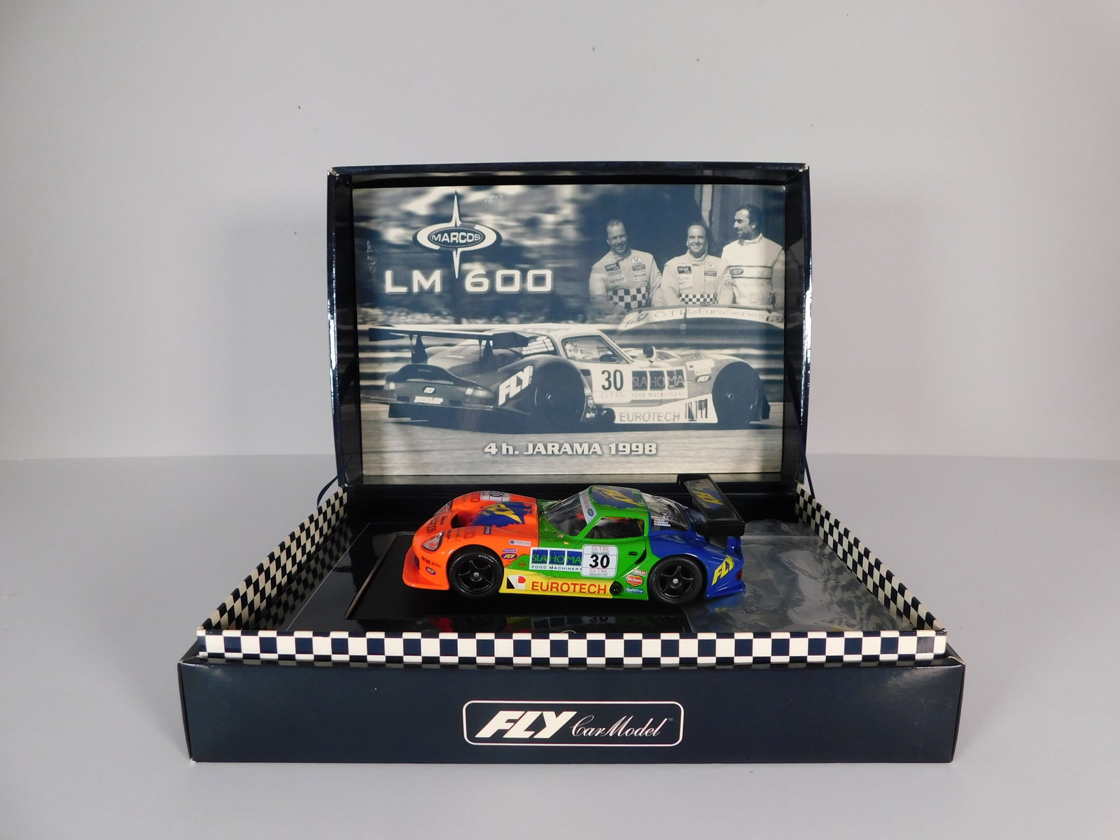 Fly Car Model LM 600 4h. Jarama 1998 #30: Fly Car Model LM 600 4h. Jarama 1998 #30 Marcos 1/32 Slot Car, with original case. Weight 11oz.