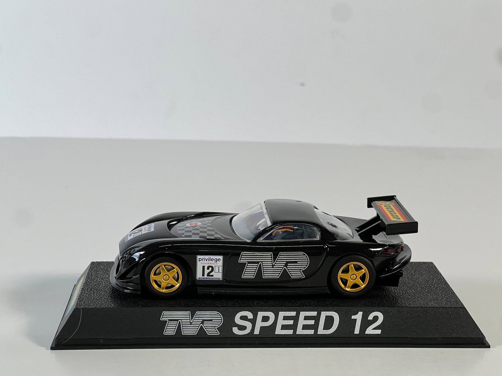 Scalextric TVR Speed 12 #12: Scalextric TVR Speed 12 #12 Dunlop 1/32 Slot Car , with original case. Weight: 8 oz.