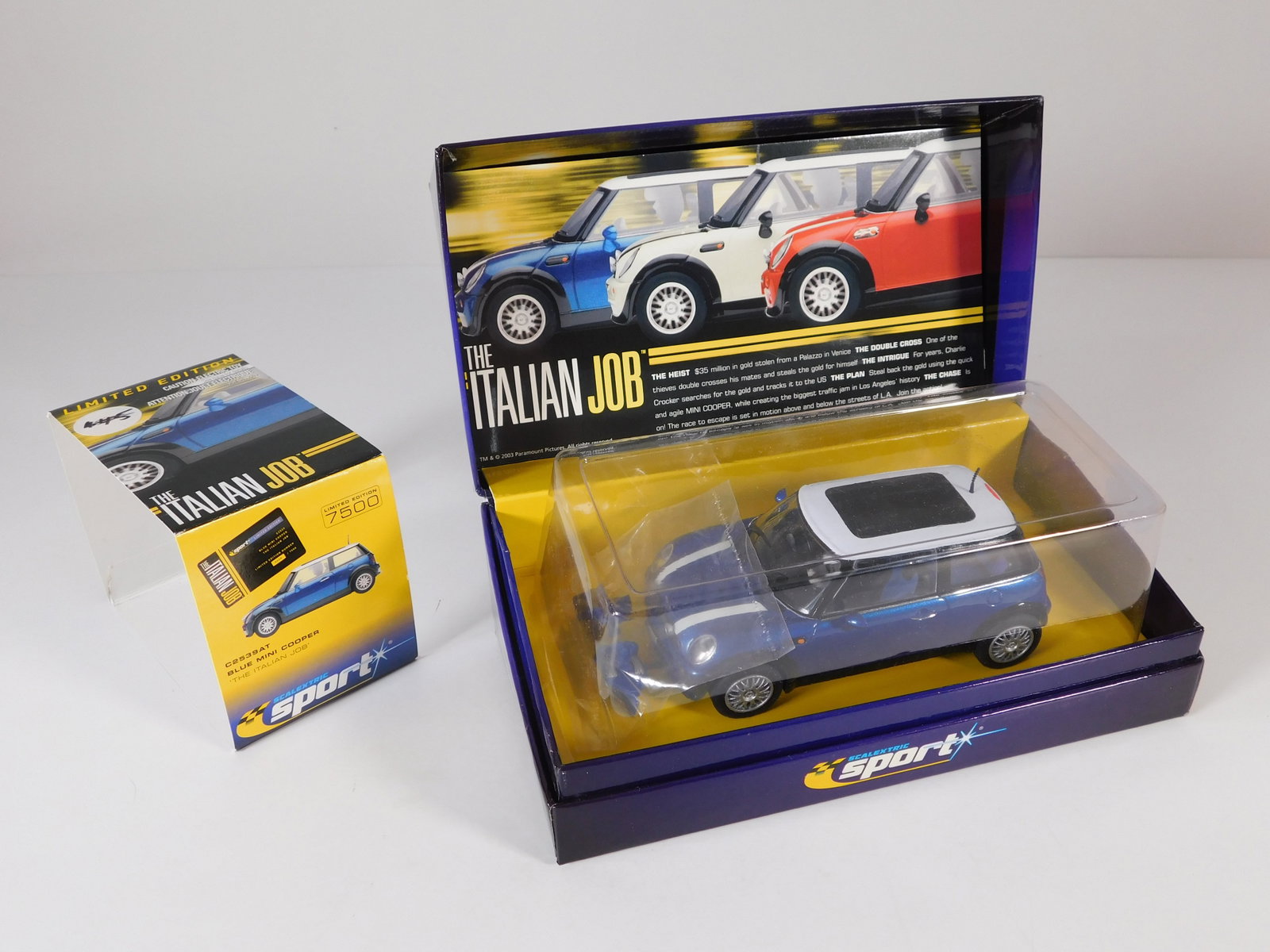 Scalextric Sport Blue Mini Cooper - Limited Edition: Scalextric Sport Blue Mini Cooper 7500 The Italian Job 1/32 Slot Car. Reference #C2539A, with original case. Weight: 9.3 oz. Limited Edition Number 0947/7500