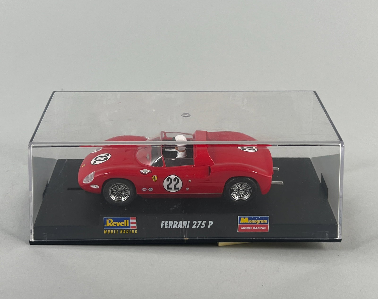 Revell Ferrari 275 P #22: Revell Ferrari 275 P #22 1/32 Slot Car, presented in its original display case. Weight: 6 oz. Dimensions: 3'' x 7.25'' x 3.25''. 