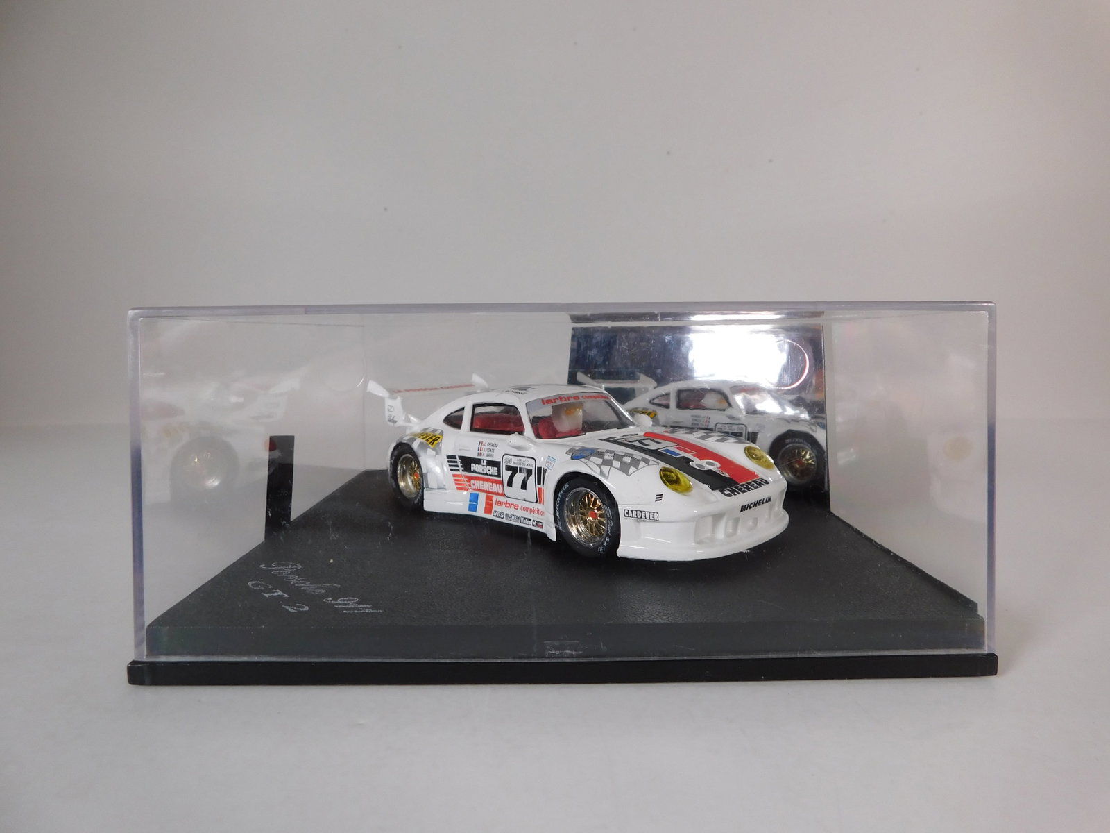 ProSlot Porsche 911 GT2 #77: ProSlot Porsche 911 GT2 #77 Chereau 1/32 Slot Car. Reference #PS1003, with original case. Weight: 9.3 oz.