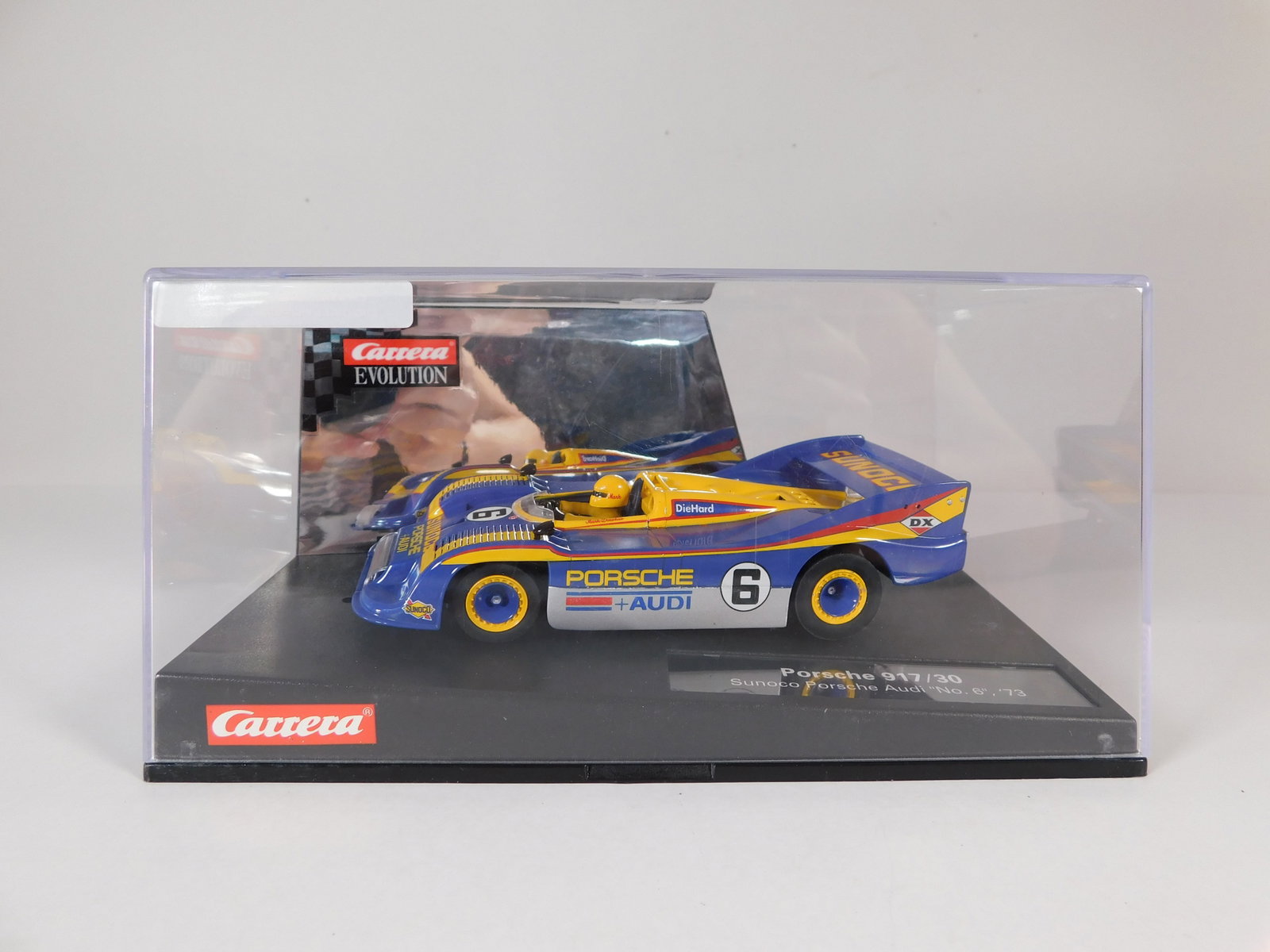 Carrera Evolution Porsche 917/30 Sunoco Porsche Audi '73 #6: Carrera Evolution Porsche 917/30 Sunoco Porsche Audi '73 #6 1/32 slot car. Reference #27327, with original case. Weight: 15.2 oz. Digitally Upgradeable.