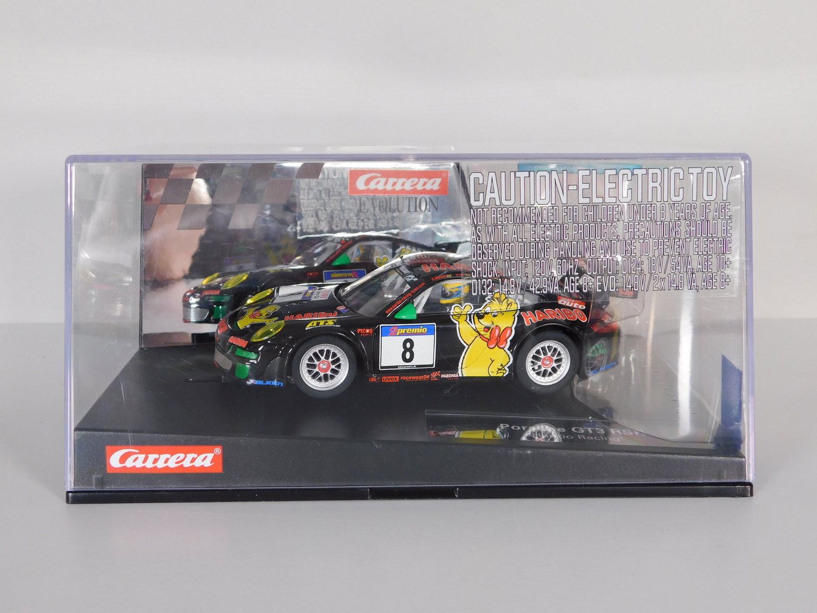 Carrera Evolution Porsche GT3 RSR Haribo Racing #8: Carrera Evolution Porsche GT3 RSR Haribo Racing #8 Haribo 1/32 Slot Car. Reference #27457, with original case. Weight: 15.7 oz.