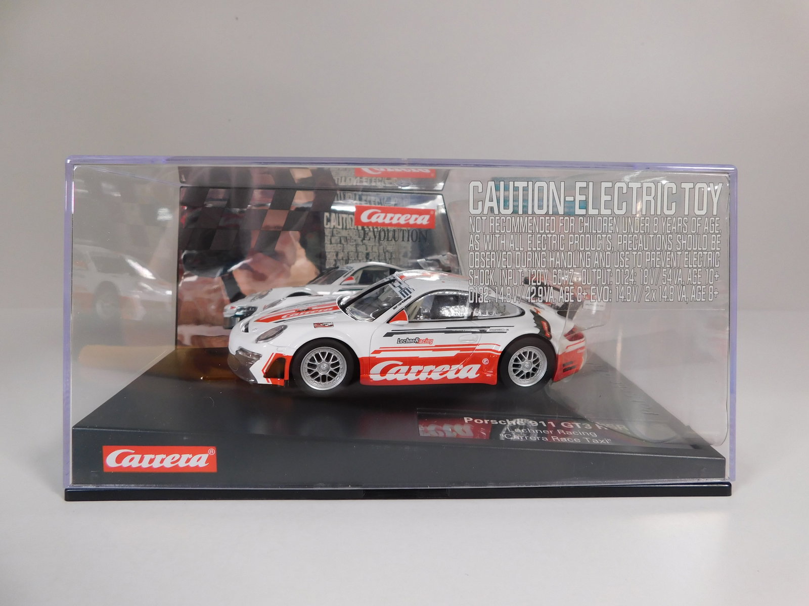 Carrera Evolution Porsche 911 GT3 RSR Lechner Racing: Carrera Evolution Porsche 911 GT3 RSR Lechner Racing Carrera Race Taxi 1/32 Slot Car. Reference #20027566, with original case. Weight: 17 oz.