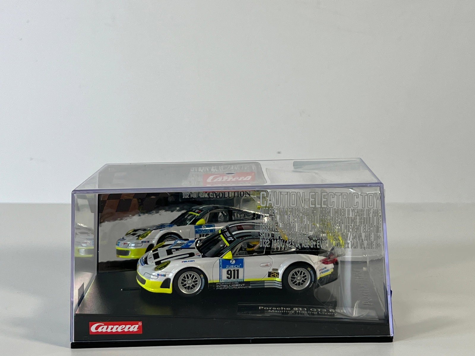 Carrera Evolution Porsche 911 GT3 RSR #911: Carrera Evolution Porsche 911 GT3 RSR #911 1/32 Slot Car, with original case. Case measures 4 x 8 inches. Weight: 17 oz. Digitally upgradeable.