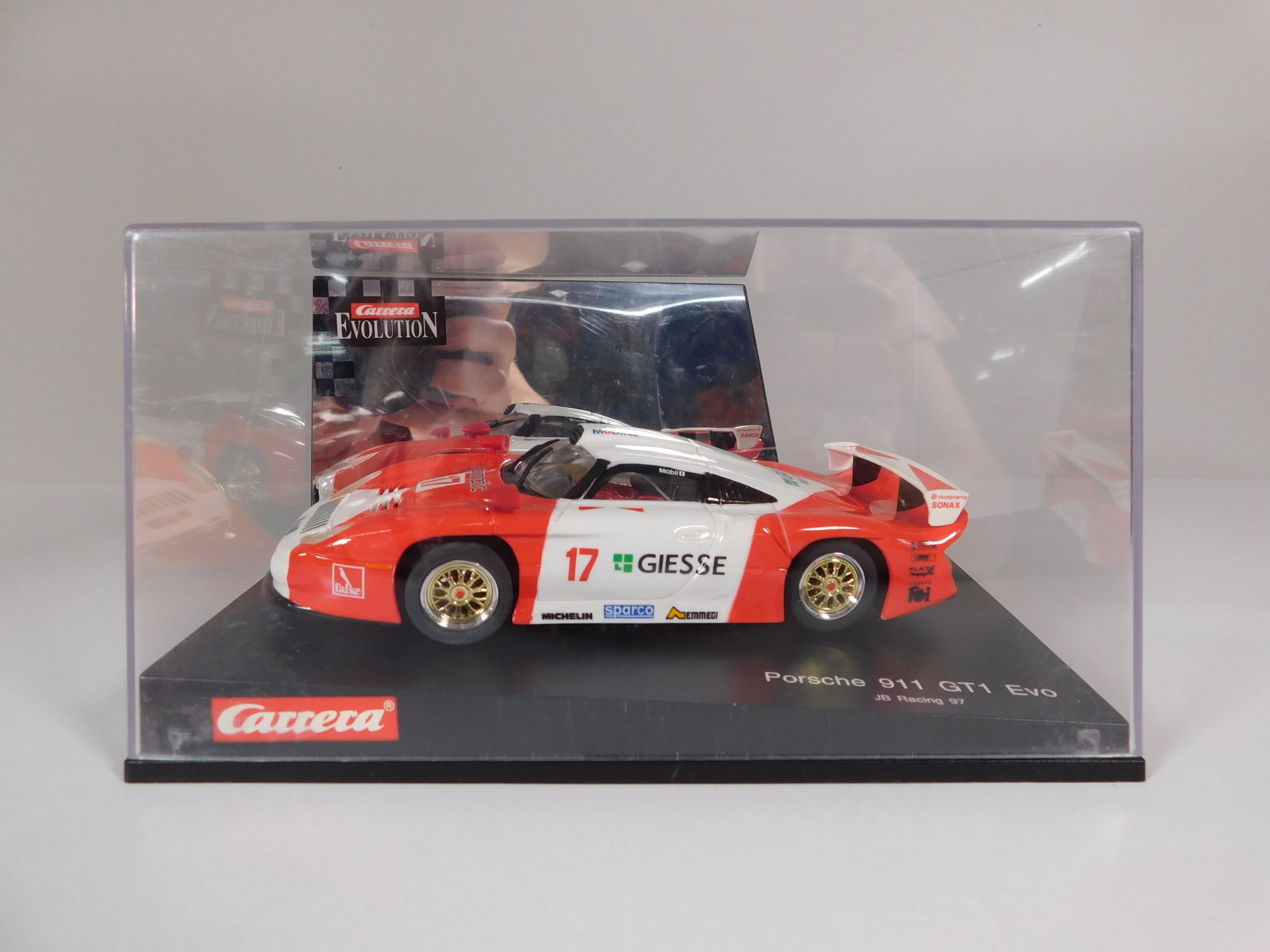Carrera Evolution Porsche 911 GTI Evo JB Racing 97 #17: Carrera Evolution Porsche 911 GTI Evo JB Racing 97 #17 Aprimatic 1/32 Slot Car. Reference #25402, with original case. Weight: 11.8 oz.