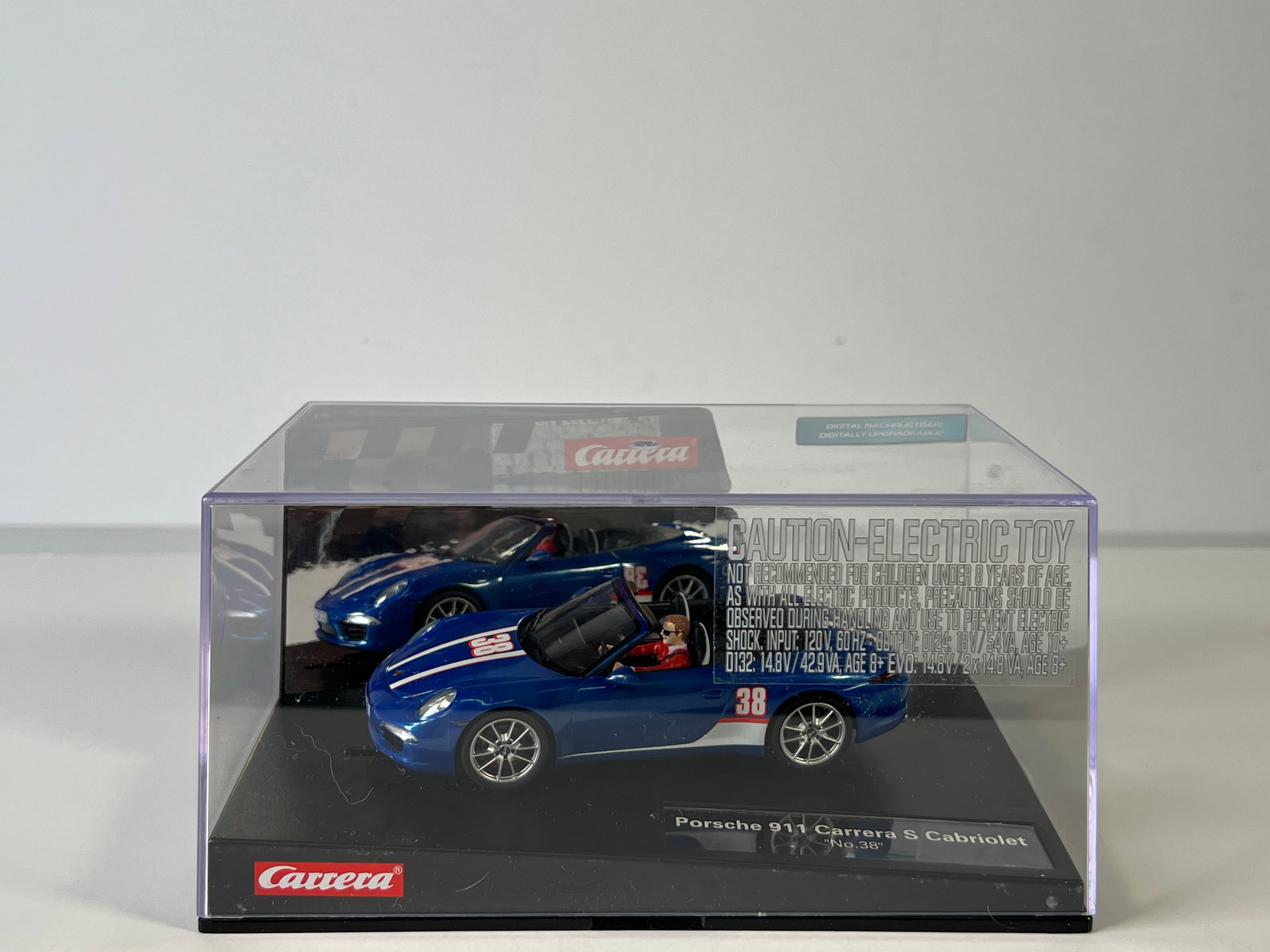 Carrera Evolution Porsche 911 Carrera S Cabriolet #38: Carrera Evolution Porsche 911 Carrera S Cabriolet #38 1/32 Slot Car, with original case. Weight: 15 oz. Digitally upgradeable.
