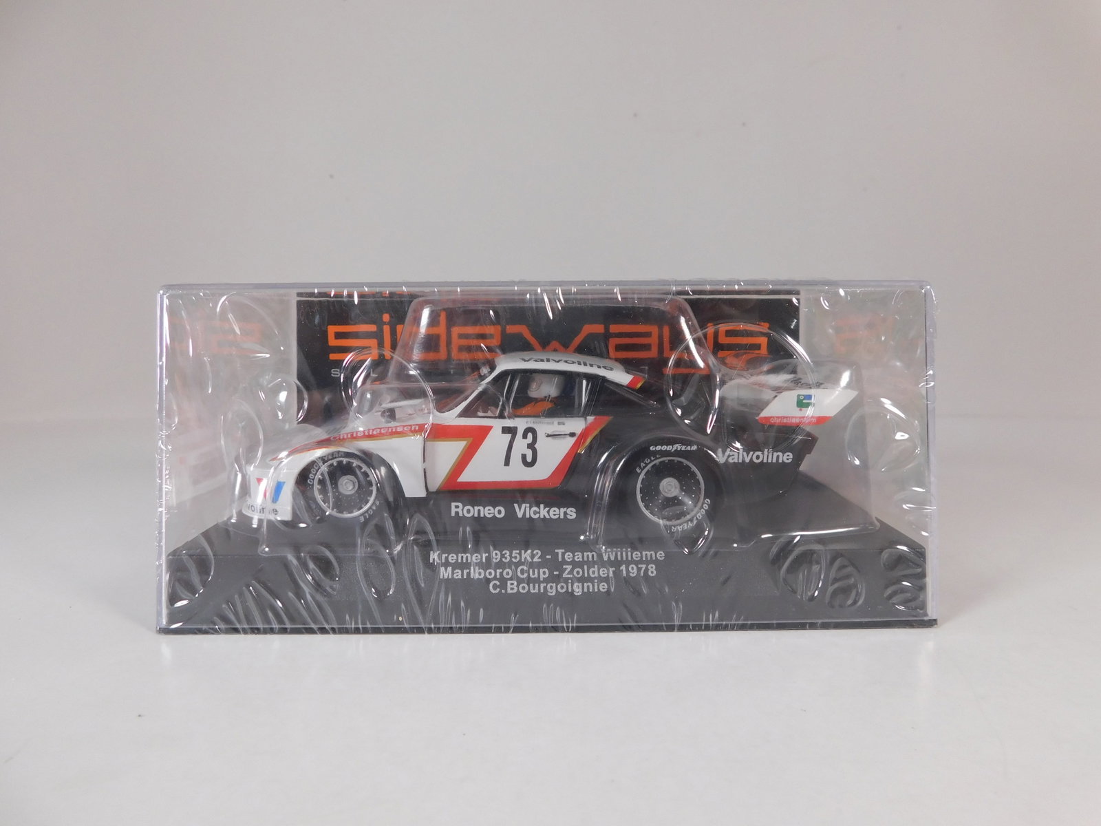 Sideways Kremer 935 K2 Zolder 1978 #73: Sideways Kremer 935 K2 Team Willeme Marlboro Cup Zolder 1978 C.Bourgoignie #73 Roneo Vickers 1/32 Slot Car. Reference #SW55. Reference motor/chassis SW32, with original case. Weight: 7.3 oz. Shrink-wr