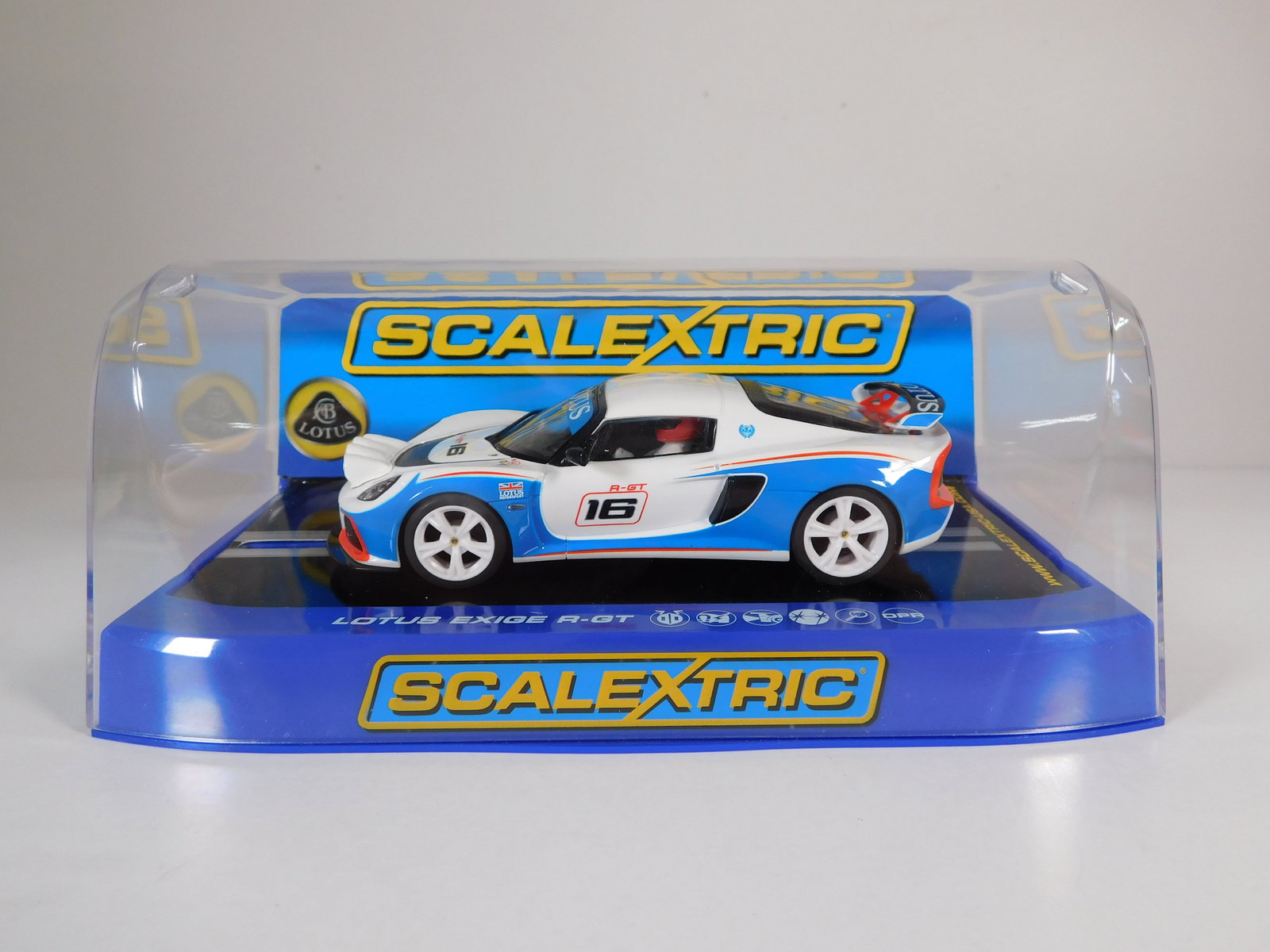 Scalextric Lotus Exige R-GT White/Blue #16: Scalextric Lotus Exige R-GT White/Blue #16 1/32 Slot Car. Reference #C3520, with original case. Weight: 7.8 oz.