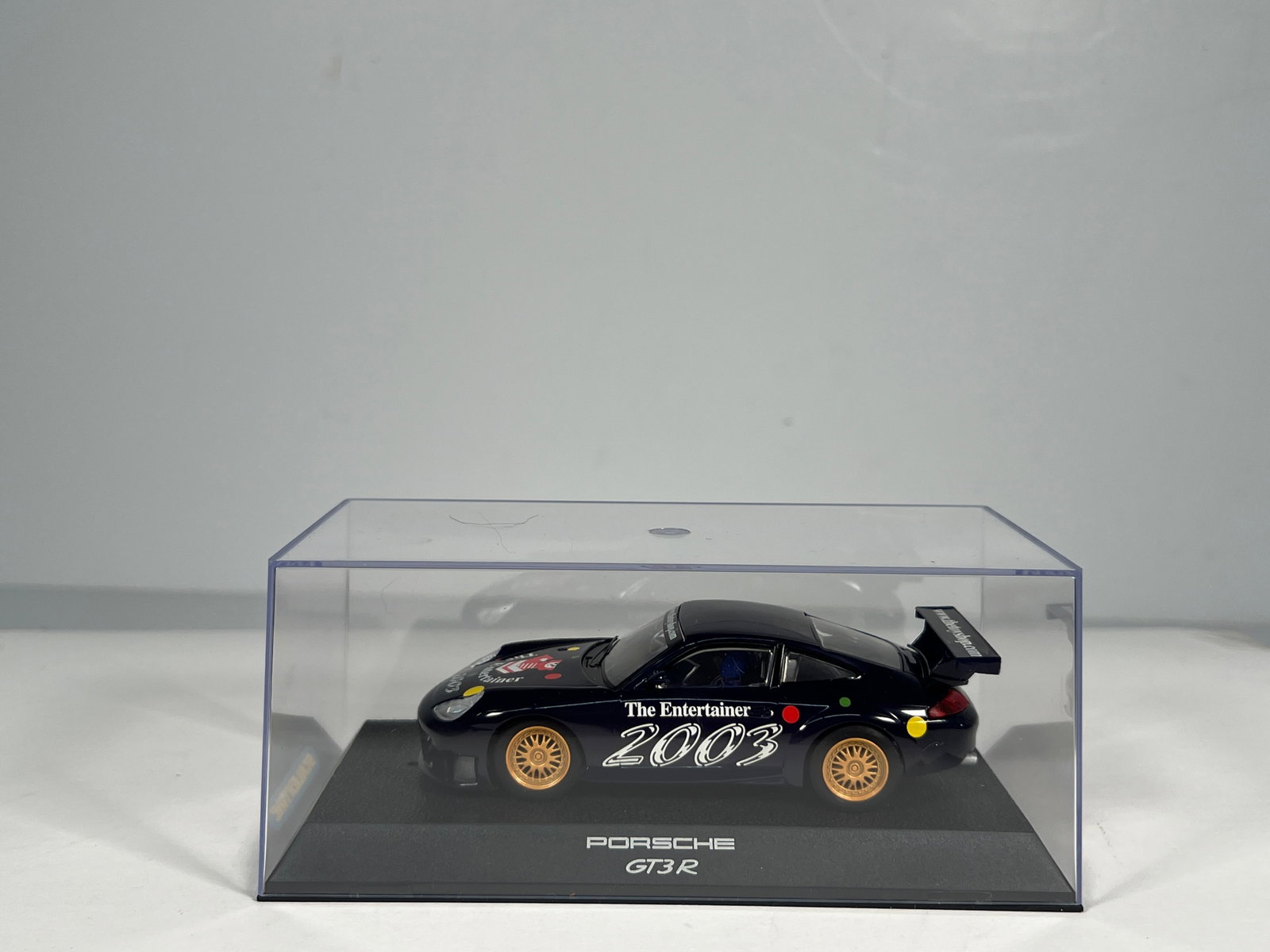 Scalextric Porsche GT3R 'The Entertainer 2003': Scalextric Porsche GT3R 'The Entertainer 2003' 1/32 Slot Car, with original case. Weight: 7 oz.