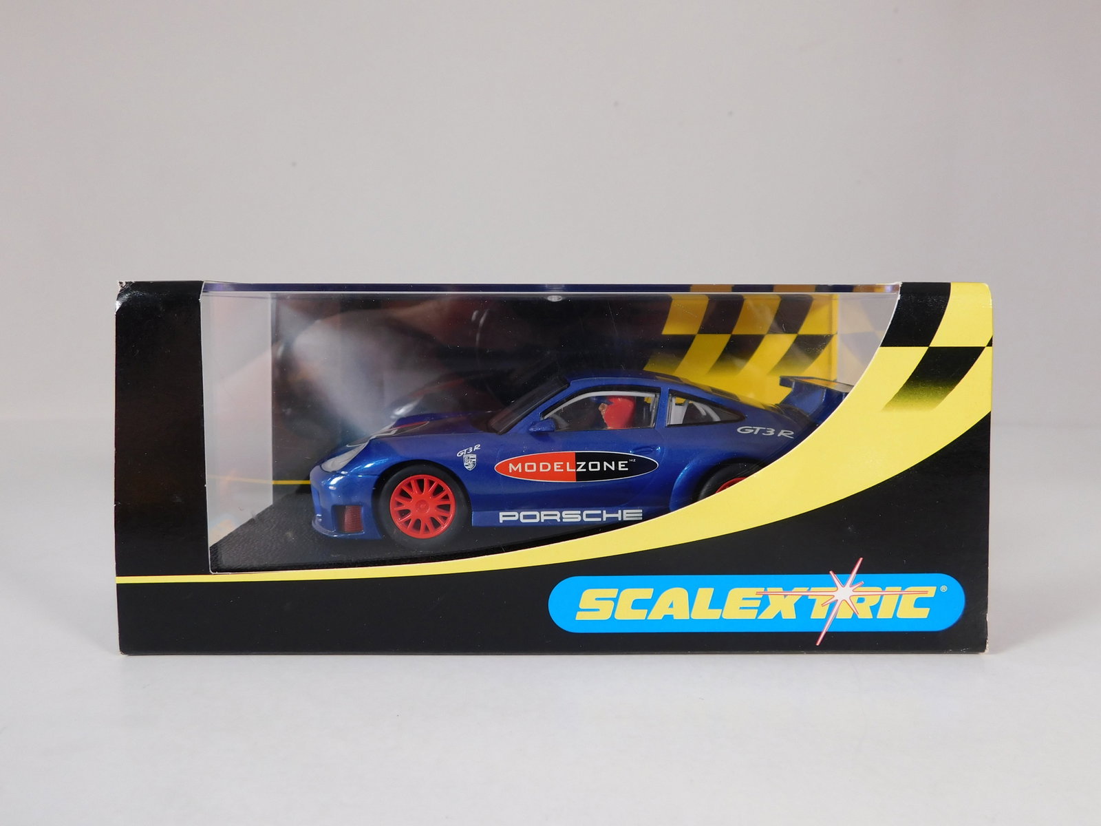 Scalextric Porsche 911 GT3R Modelzone: Scalextric Porsche 911 GT3R Modelzone 1/32 Slot Car. Reference #C2470, with original case. Weight: 7.9 oz.