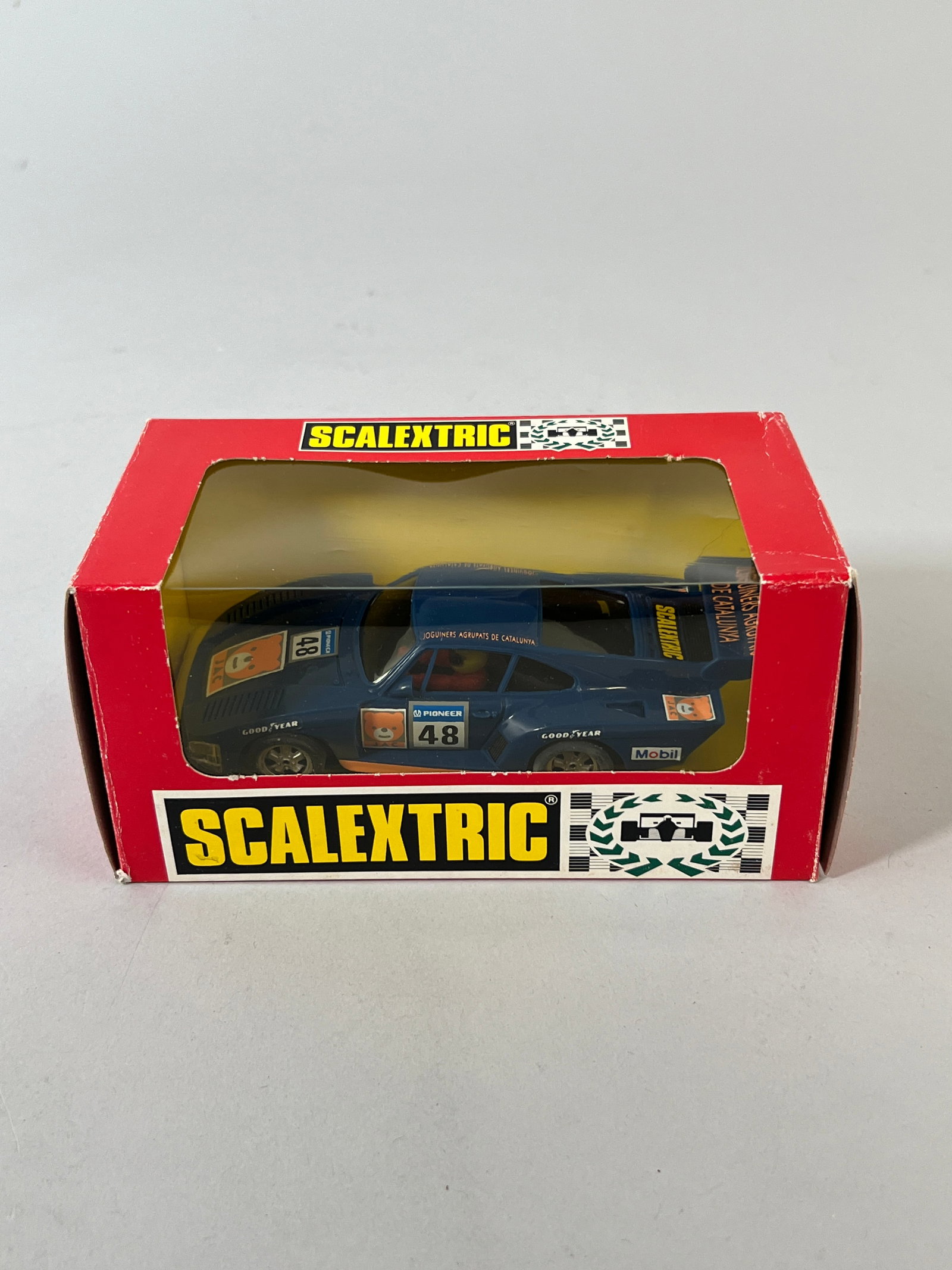 Scalextric Exin Porsche 935 #48: Scalextric Exin Porsche 935 #48, model number 1173, 1/32 slot car, in original packaging. Weight 6 oz. Dimensions: 3.75'' x 6.75'' x 3.5''. 