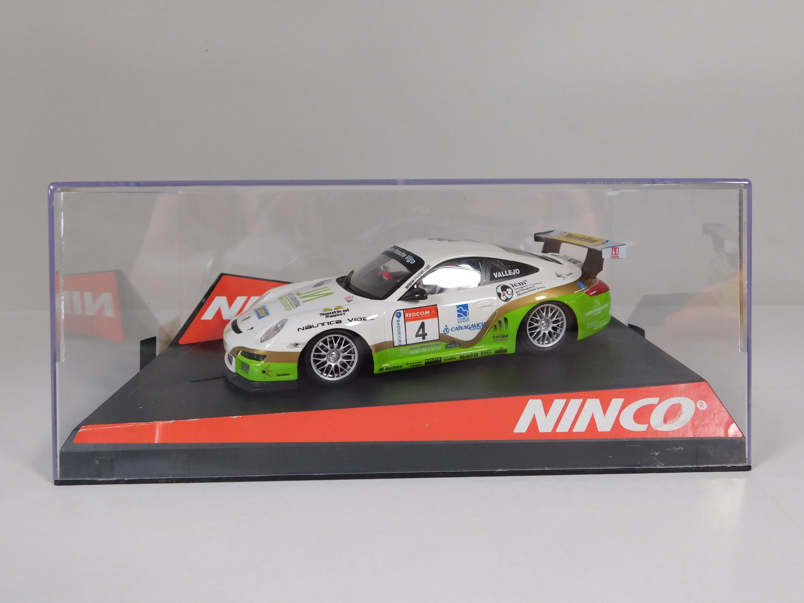 Ninco Porsche 997 Vallejo #4: Ninco Porsche 997 Vallejo #4 Nupeldine 1/32 Slot Car. Reference #50464, with original case. Weight: 9.5 oz.