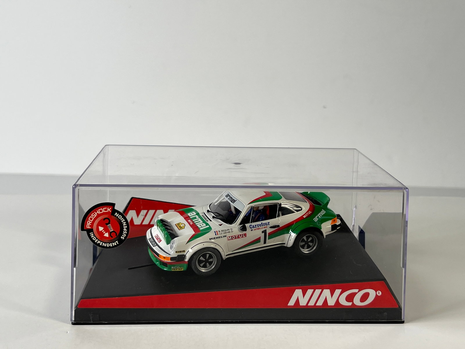 Ninco Porsche 911 SC Armel #1: Ninco Porsche 911 SC Armel #1 1/32 Slot Car. Reference #50386, with original case. Weight: 9 oz.