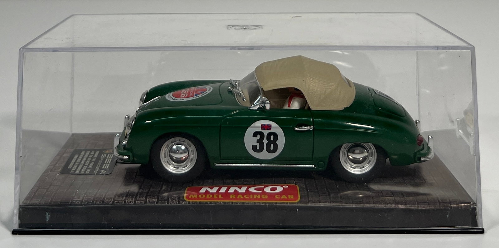 Ninco Porsche 356A Speedster International Meeting England #38: Ninco Porsche 356A Speedster International Meeting England #38 Slot Car, 56-RB-47, with original case. Dimensions: 2.5'' x 7''. Weight: 6 oz.