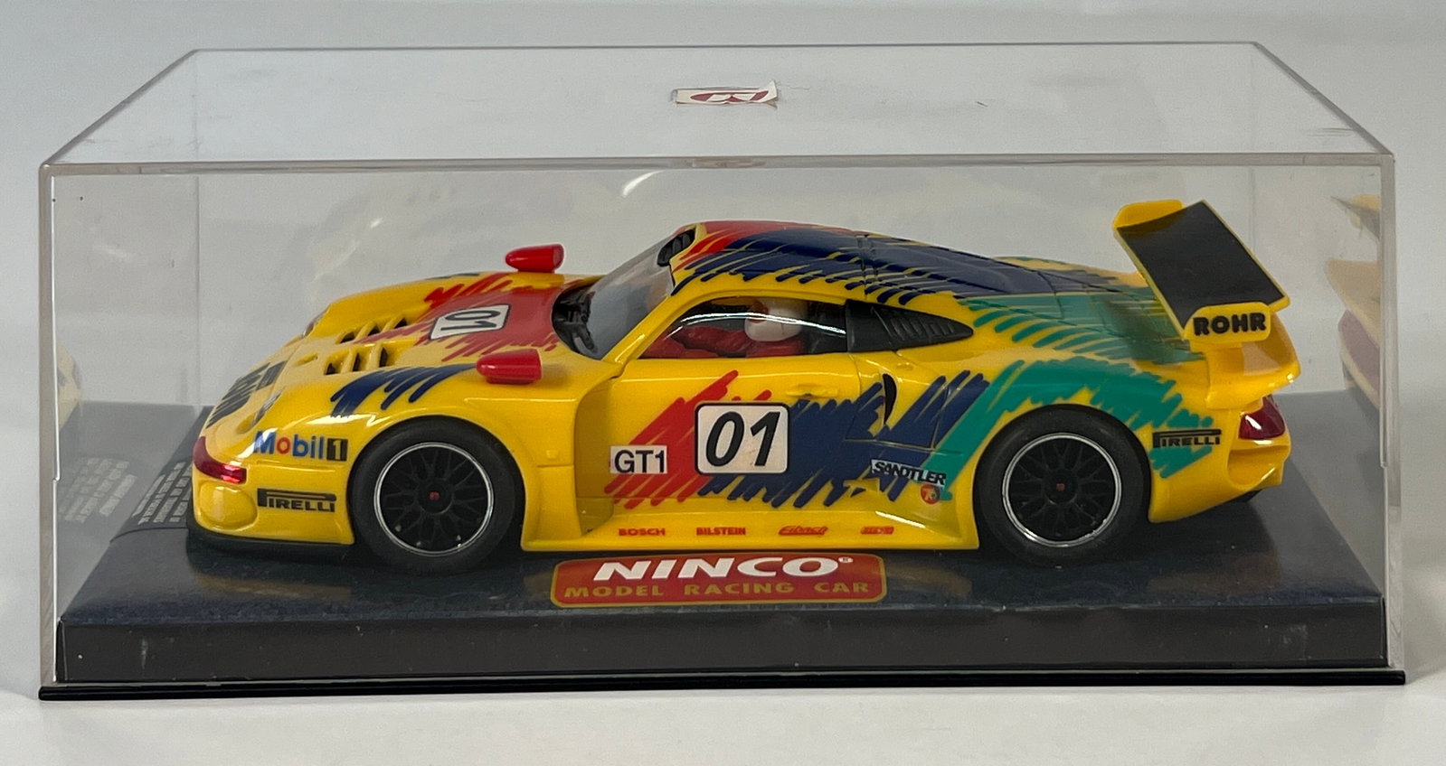 Ninco Porsche 911 GT1 #01: Ninco Porsche 911 GT1 #1 Rohr 1/32 Slot Car, with original case. Display case measures 2.5'' x 6.5''. Weight: 7 oz.