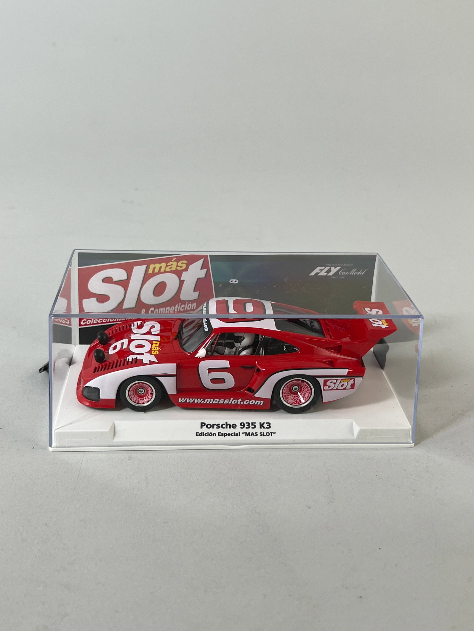 Fly Porsche 935 K3 "Mas Slot" Special Edition #6: Fly 'Mas Slot' Porsche 935 K3 1/32 slot car. It measures 2.75" x 6.25" x 3.25" and weighs 6.4 oz. It comes in its original case. 