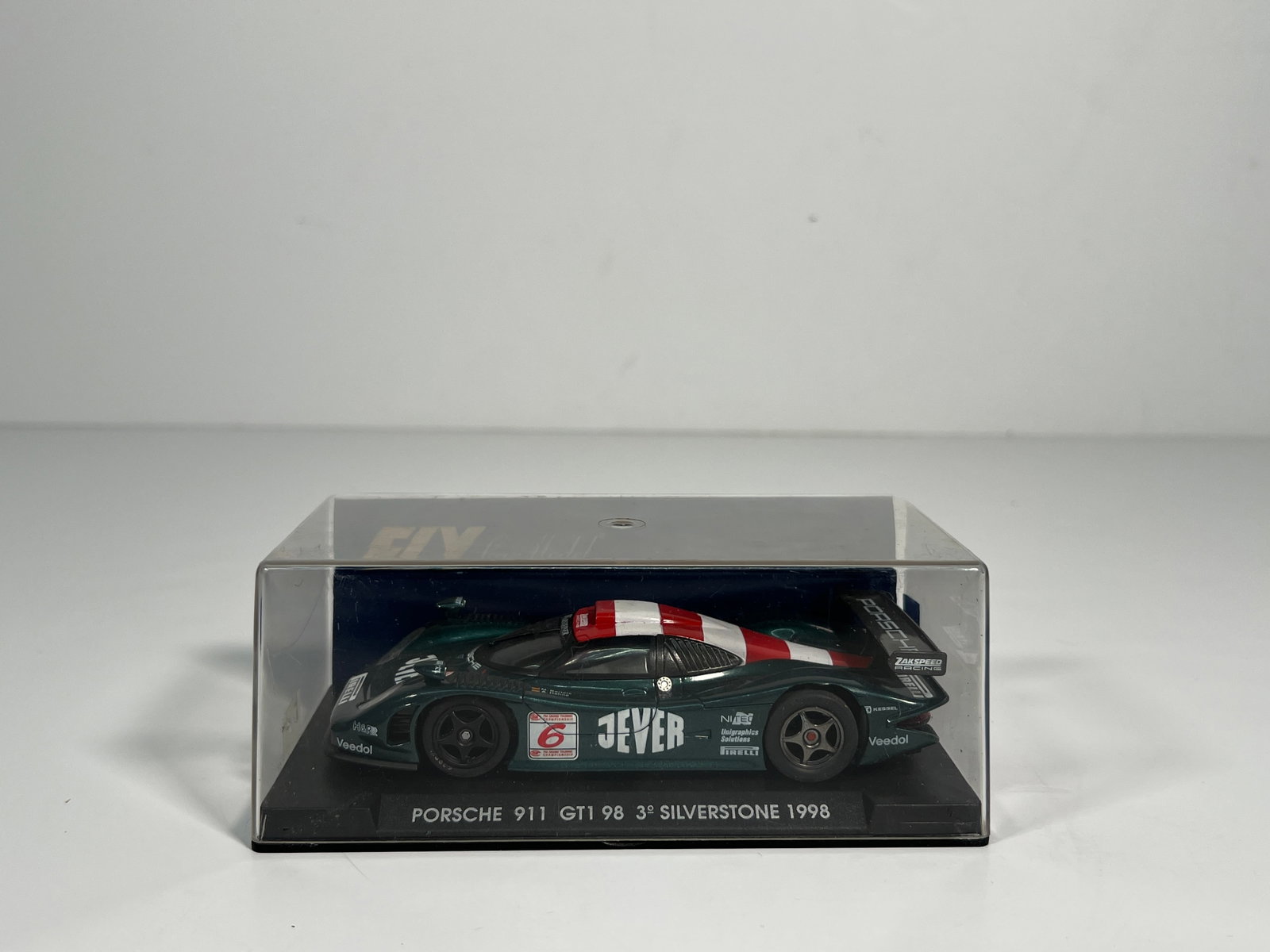 Fly Car Model Porsche 911 GT1 3rd Silverstone 1998 #6: Fly Car Model Porsche 911 GT1 98 3rd Silverstone 1998 #6 Jever 1/32 Slot Car. Reference #A74, with original case. Weight: 8oz.