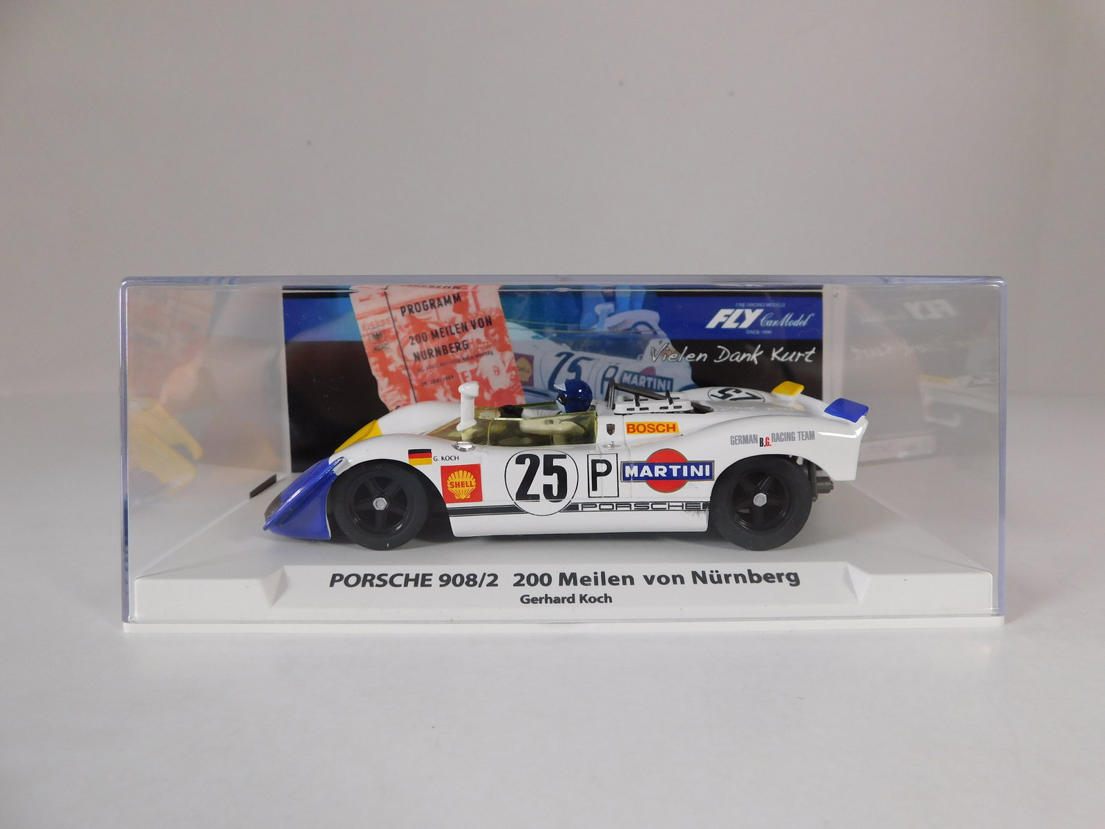 Fly Car Model Porsche 908/2 200 Meilen von Nurnberg #25: Fly Car Model Porsche 908/2 200 Meilen von Nurnberg Gerhard Koch 29 Juni 1969 #25 Martini 1/32 Slot Car. Reference #99169, with original case. Weight: 6.1 oz.