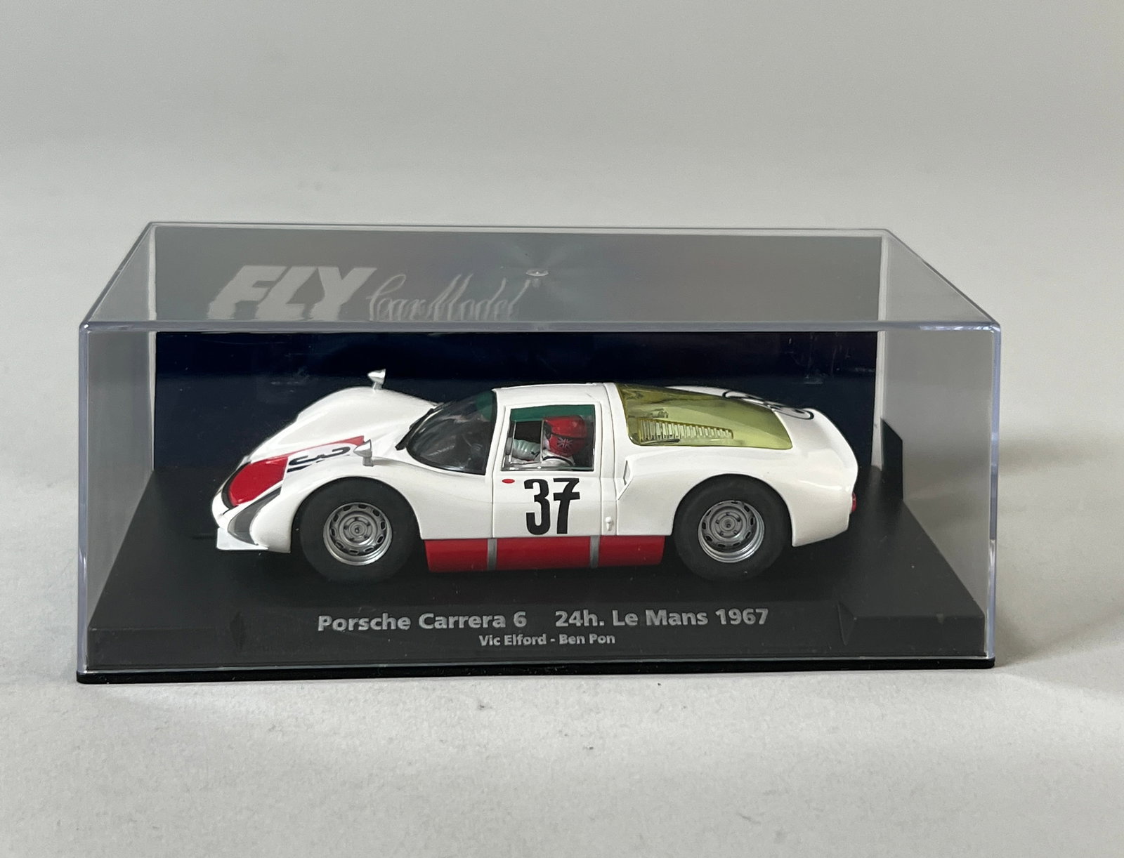 Fly Car Model Porsche Carrera 6 24h Le Mans 1967 #37: Fly Car Model Porsche Carrera 6 24h Le Mans 1967 #37 1/32 Slot Car. The model is presented in its original display case. Dimensions: 3" x 6.25" x 3.25". Weight: 6.2oz.