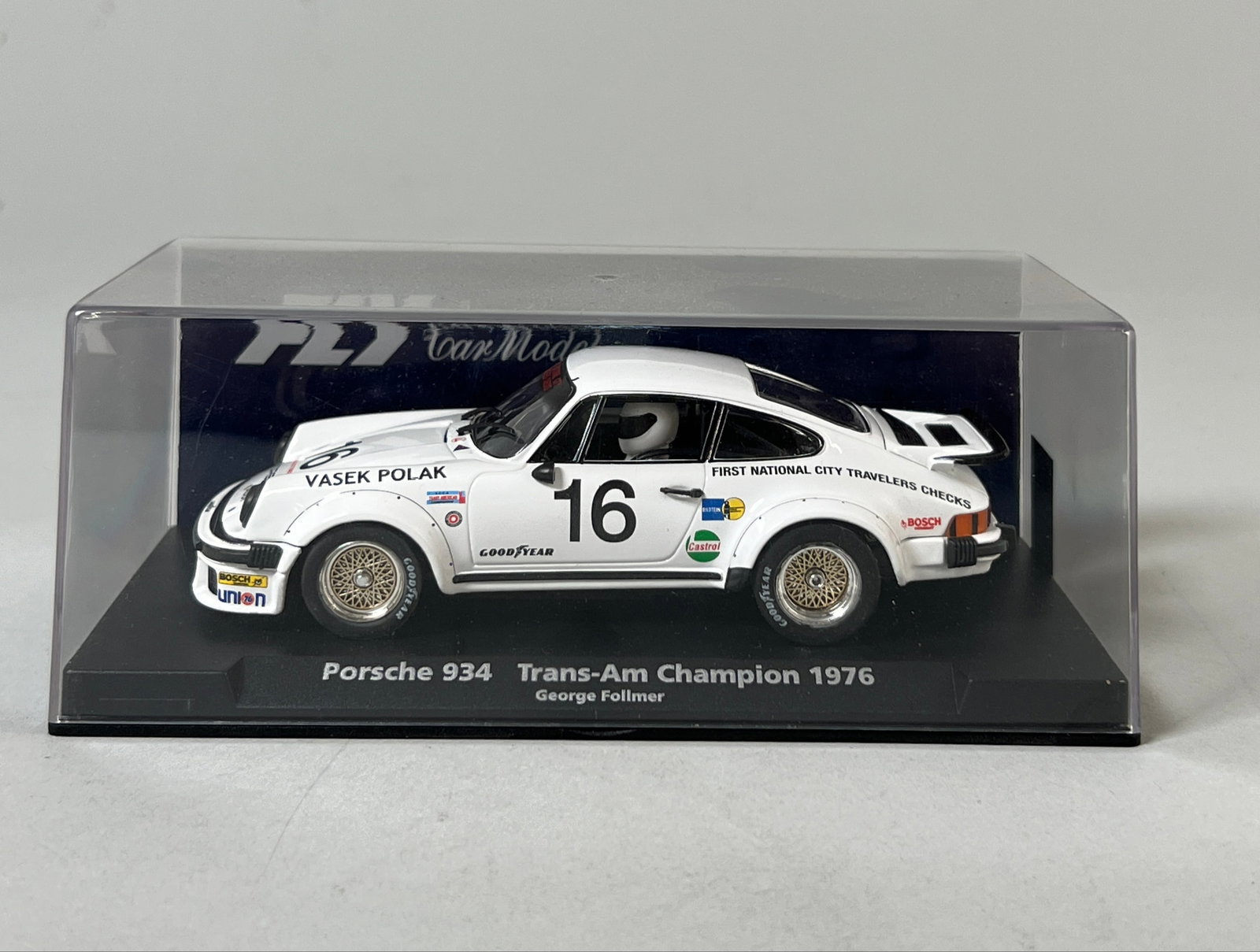 Fly Car Model Porsche 934 Trans-Am Champion 1976 #16: Fly Car Model Porsche 934 Trans-Am Champion 1976 #16 1/32 Slot Car. It comes in its original display case. Dimensions: 3'' x 6.75'' x 3.75''. Weight: 6.6oz. 