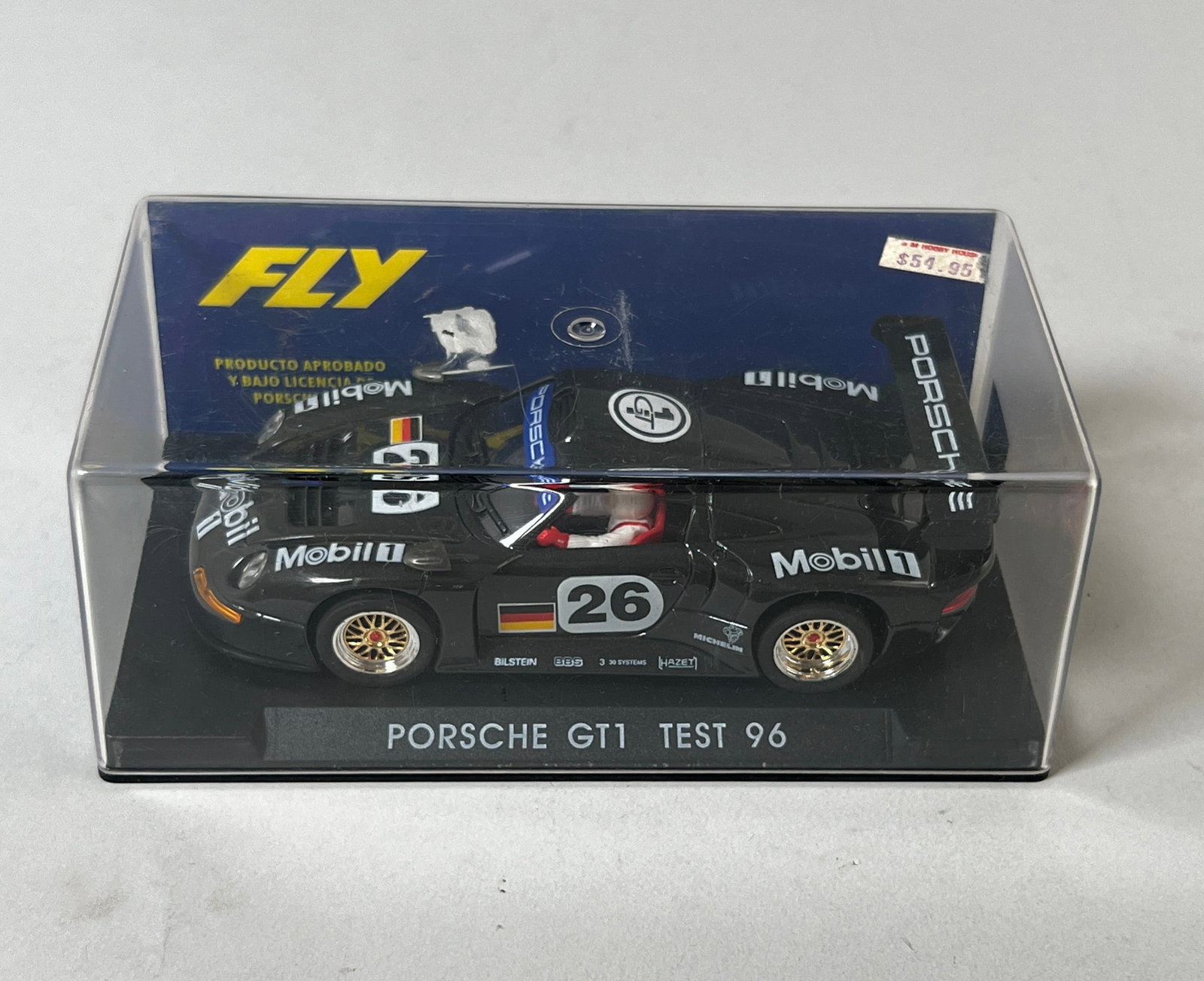 Fly Porsche GT1 Test 96 #26: Fly Porsche GT1 Test 96 #26 Mobil 1/32 scale slot car. Dimensions are 2.75" x 6.5" x 3.5" and it weighs 6.8oz. It comes in its original case. 