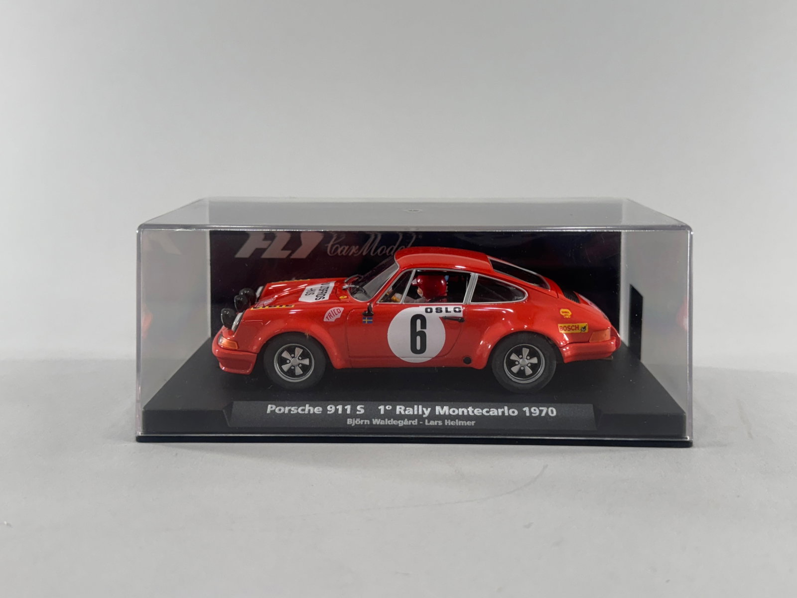Fly Car Model Porsche 911 S 1st Rally Montecarlo 1970 #6: Fly Car Model Porsche 911 S 1st Rally Montecarlo 1970 Björn Waldegård - Lars Helmer #6 Oslo 1/32 Slot Car, comes in a clear display case. Dimensions: 6 9/16'' x 3 1/2'' x 2
