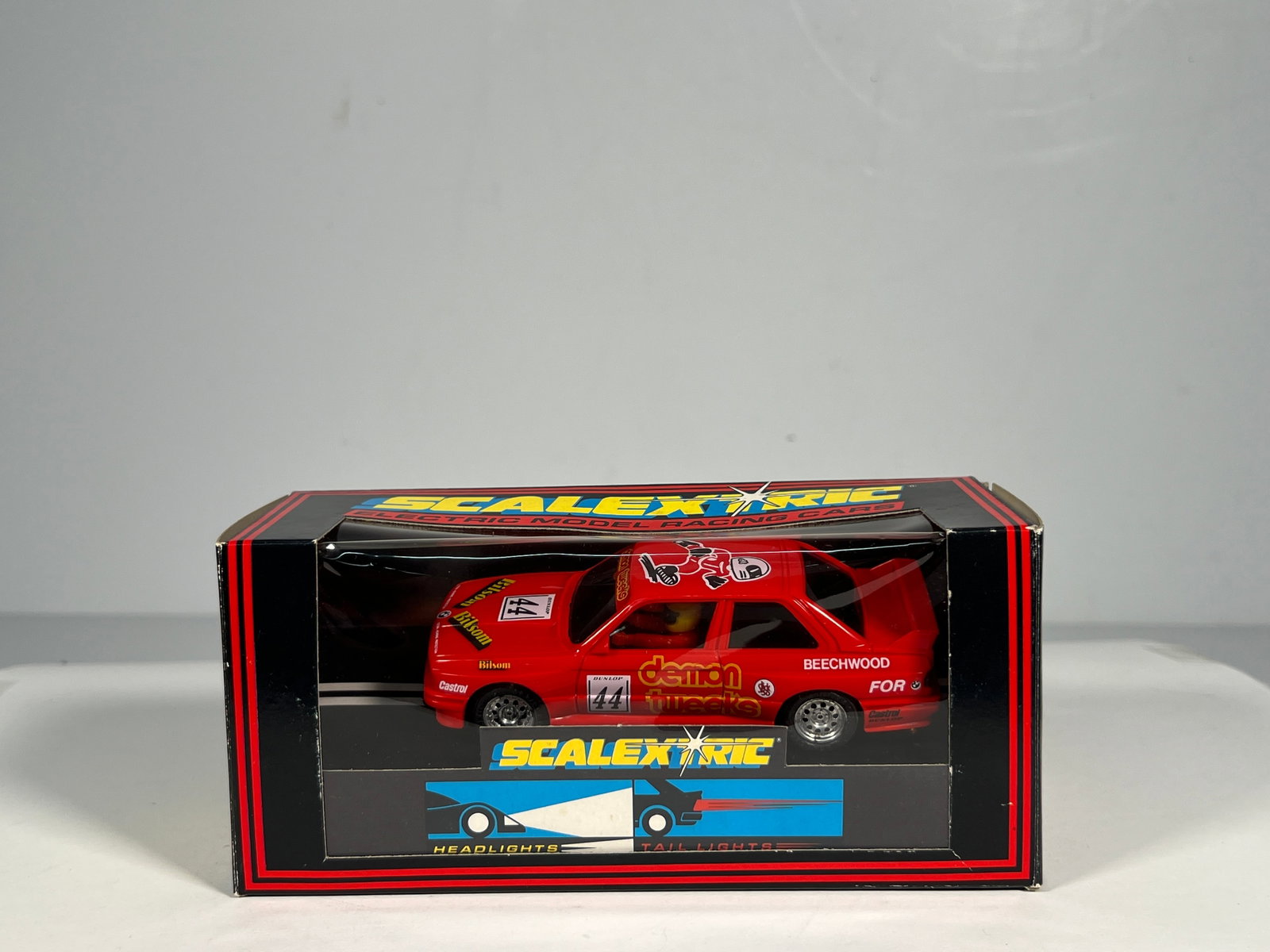 Scalextric BMW M3 #44: Scalextric BMW M3 #44 demon 1/32 Slot Car. Reference #C.409, with original case. Weight: 5 oz.