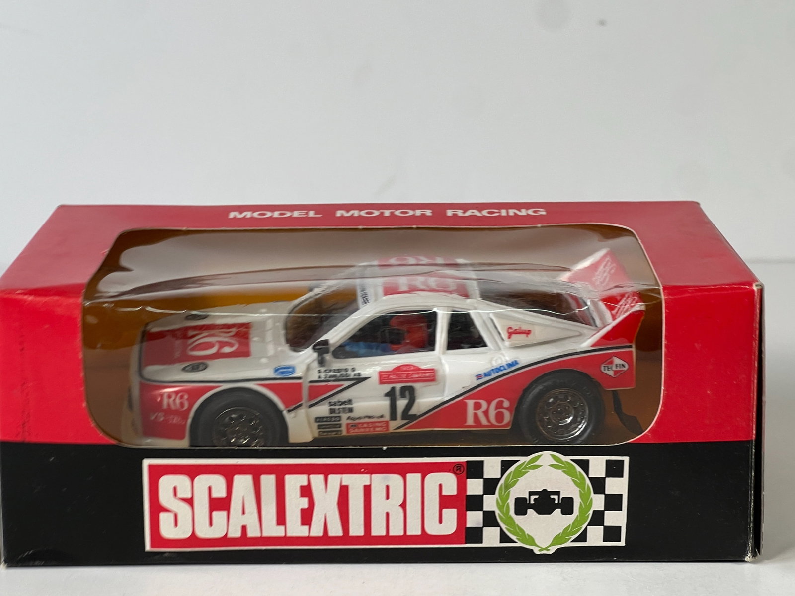 Scalextric Lancia 037 R6 #12: Scalextric Lancia 037 R6 #12 1/32 Slot Car. Reference #4086, with original case. Weight: 6 oz.