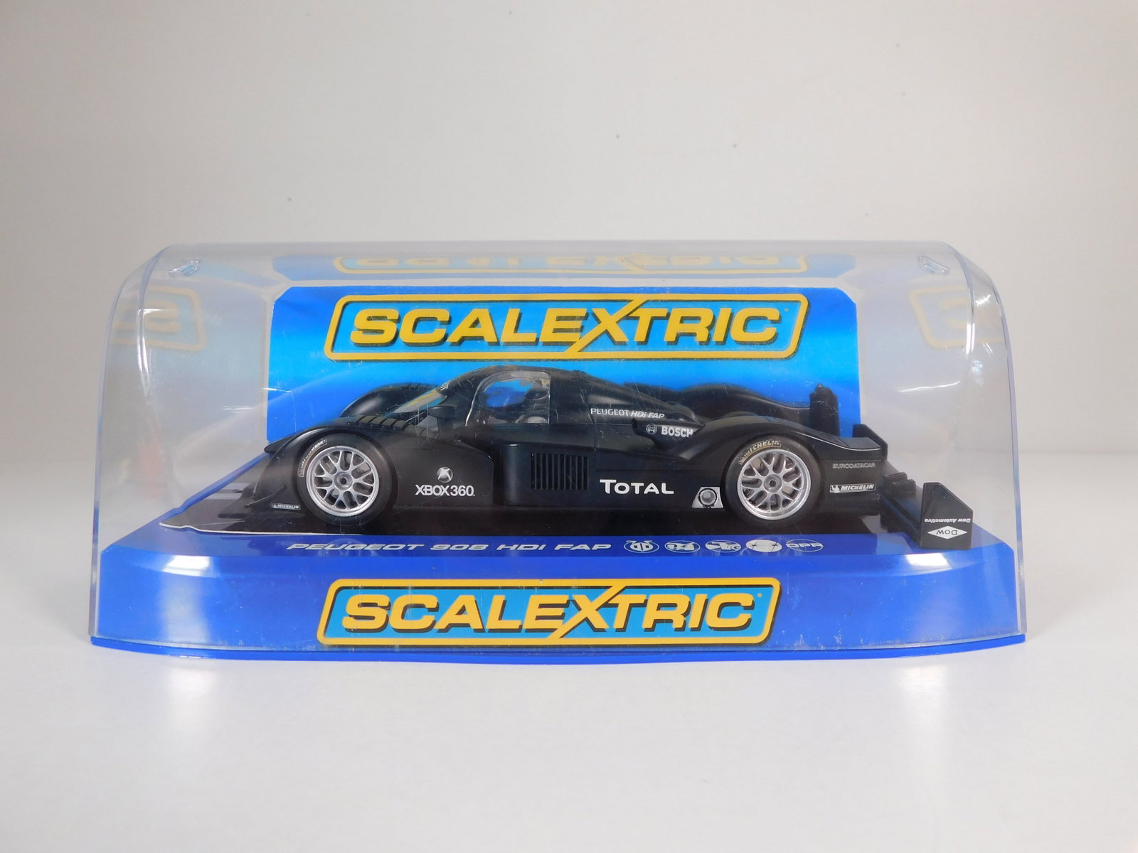 Scalextric Peugeot 908 HDI FAP 2007 Test Car: Scalextric Peugeot 908 HDI FAP 2007 Test Car Bosch 1/32 Slot Car. Reference #C2898, with original case. Weight: 8.4 oz.