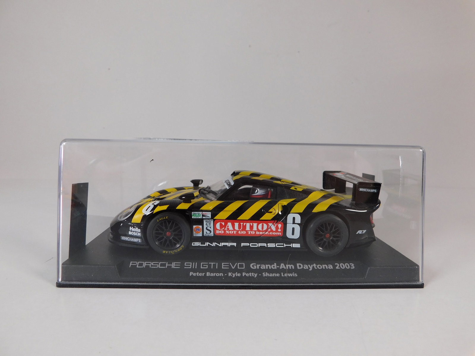 Fly Porsche 911 GT1 EVO Grand-Am Daytona 2003 #6: Fly Porsche 911 GT1 EVO Grand-Am Daytona 2003 Baron-Petty-Lewis #6 Caution! 1/32 Slot Car, with original case. Weight: 6.6 oz.