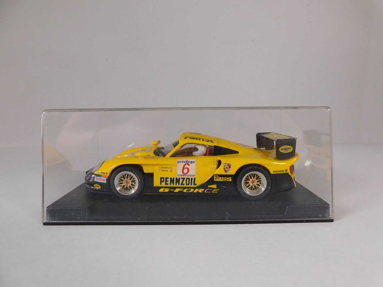 Fly Porsche 911 World Pennzoil G-Force #6: Fly Porsche 911 World Pennzoil G-Force #6 rainx 1/32 Slot Car, with original case. Weight: 6.7 oz.