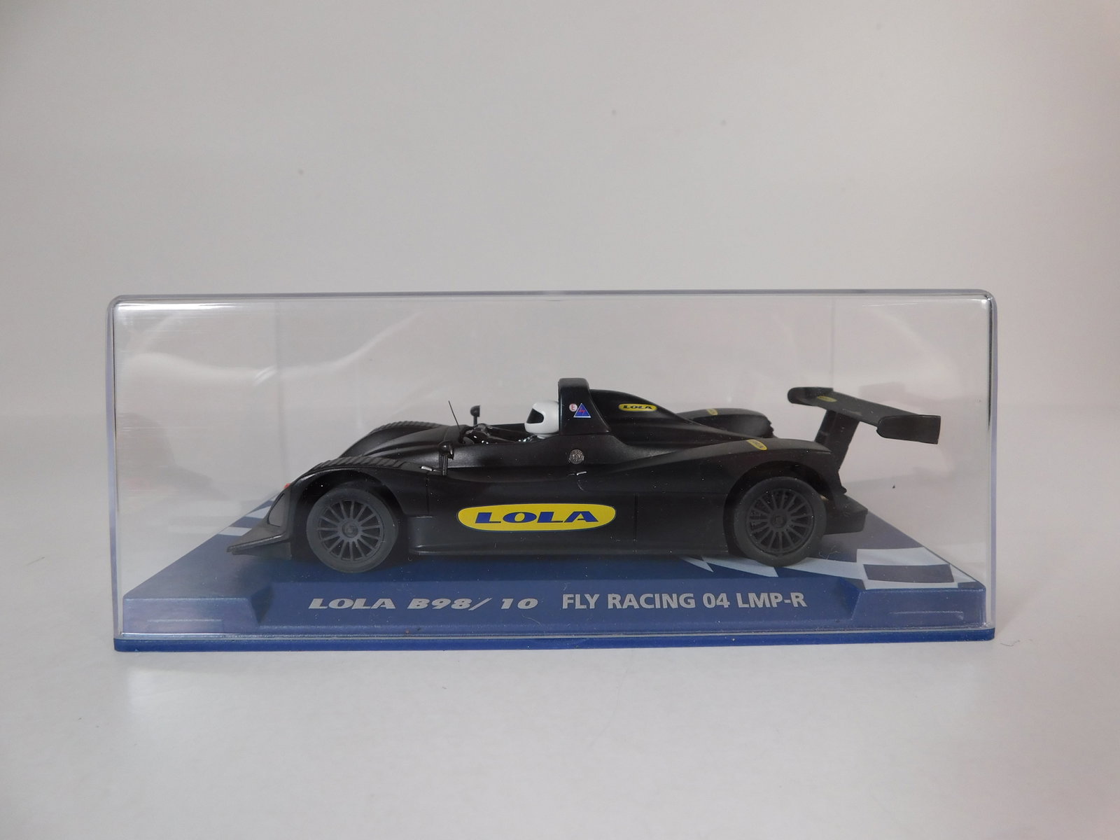 Fly Racing Lola B98/10 LMP 04 R: Fly Racing Lola B98/10 04 LMP-R 1/32 Slot Car, FLY-52. Reference #07069, with original case. Weight: 7 oz. 