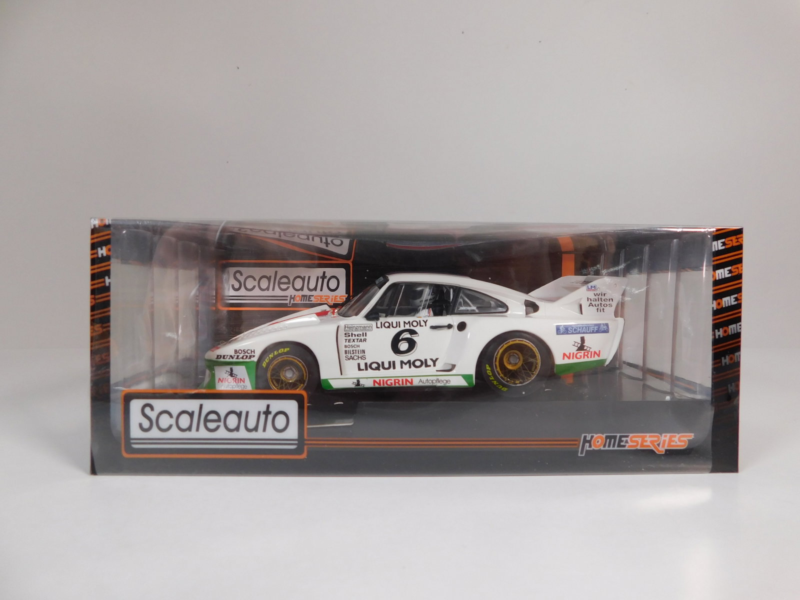 Scaleauto Porsche 935J DRM Norisring 1980 #6: Scaleauto Porsche 935J DRM Norisring 1980 Rolf Stommelen #6 Liqui Moly 1/32 Slot Car. Reference #SC-9102, with original case. Weight: 6.3oz.