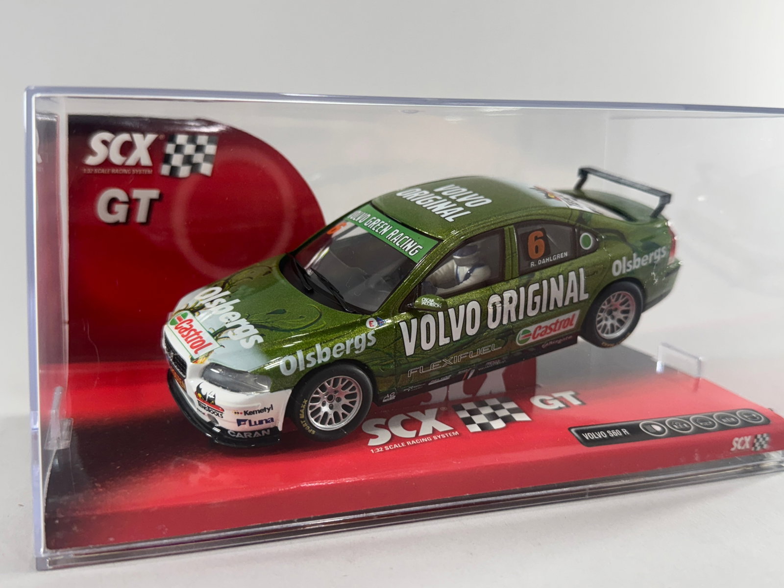 SCX Volvo S60 R "Volvo Original" Green Racing #6: SCX Volvo S60 R "Volvo Original" Green Racing #6 1/32 Slot Car. The car is presented in its original clear display case. Dimensions: 7 1/4'' x 3 7/8'' x 3 5/8''.