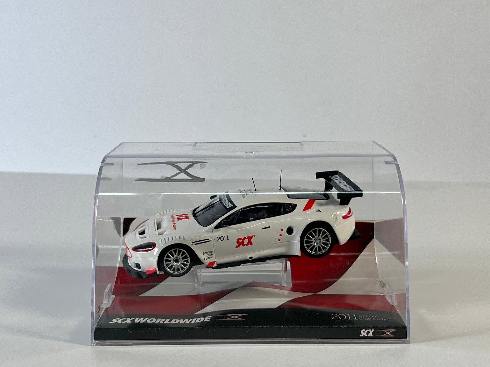 SCX Worldwide 2011 Special Club Edition: SCX Worldwide 2011 Special Club Edition 1/32 Slot Car, with original case. Case measures 4 x 7.5 inches. Total weight: 11 oz.