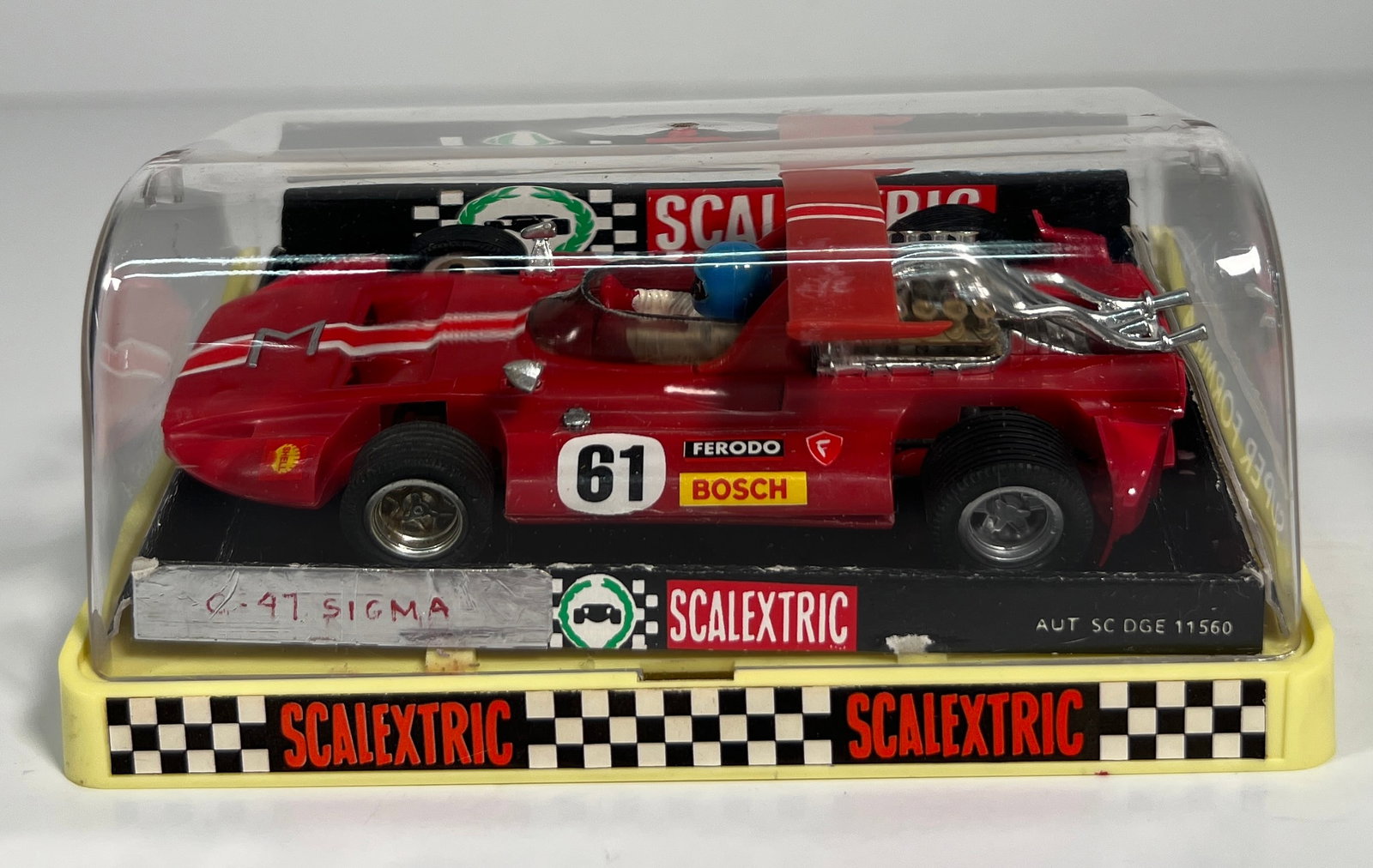 Scalextric C-47 Sigma Super Formula #61: Scalextric C-47 Sigma Super Formula #61 Bosch 1/32 Slot Car. AUT SC DGE 11560, with original case. Weight: 8oz.