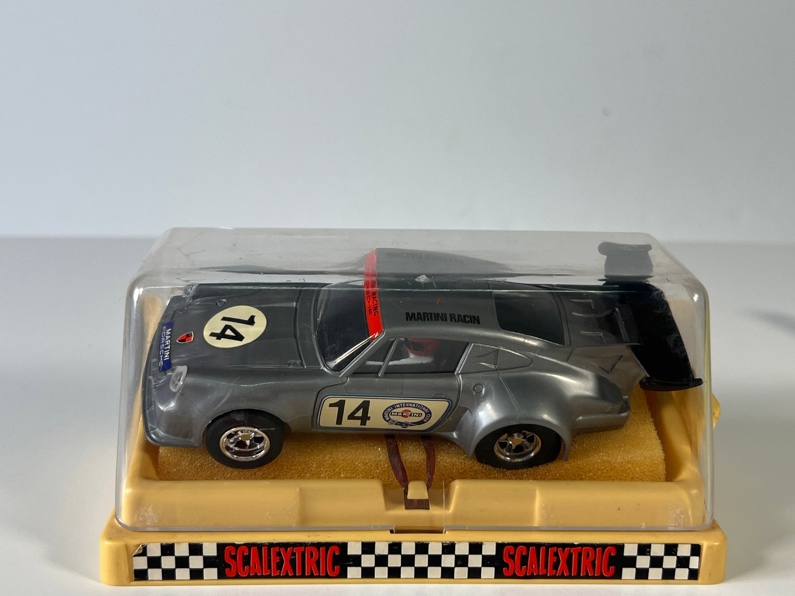 Scalextric Porsche Carrera Turbo #14: Scalextric Porsche Carrera Turbo #14 Martini 1/32 Slot Car. Reference #090155, with original case. Weight: 7oz, case length: 6oz.