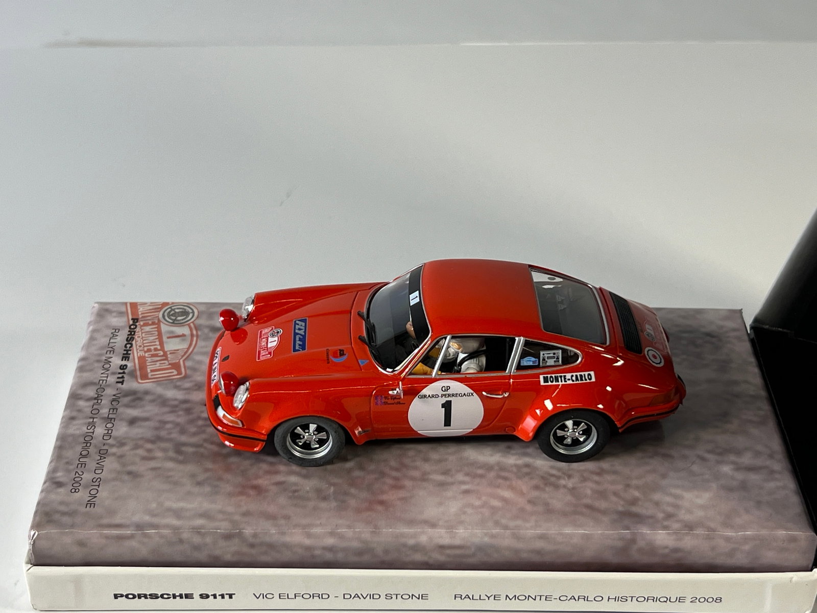Fly Car Model Porsche 911 Monte Carlo Rally Historique 2008 #1: Fly Car Model Porsche 911T Vic Elford - David Stone Monte Carlo Rally Historique 2008 #1 1/32 Slot Car, with original case. Case length 8.25 inches, weight 10 oz.