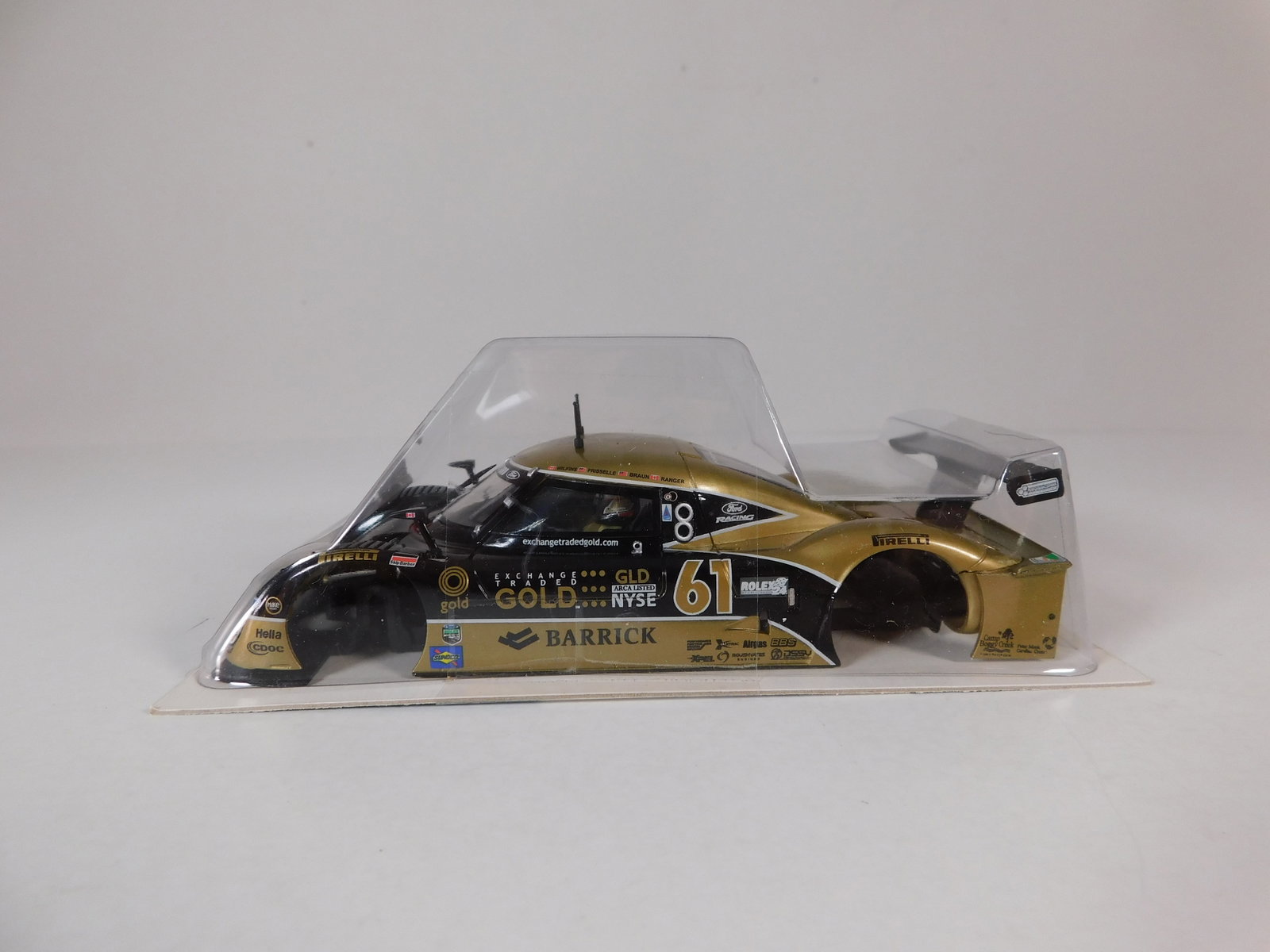 Barrick Gold #61 1/32 Slot Car Chassis: Barrick Gold #61 1/32 Slot Car chassis, with original case. Weight 1.6 oz. 