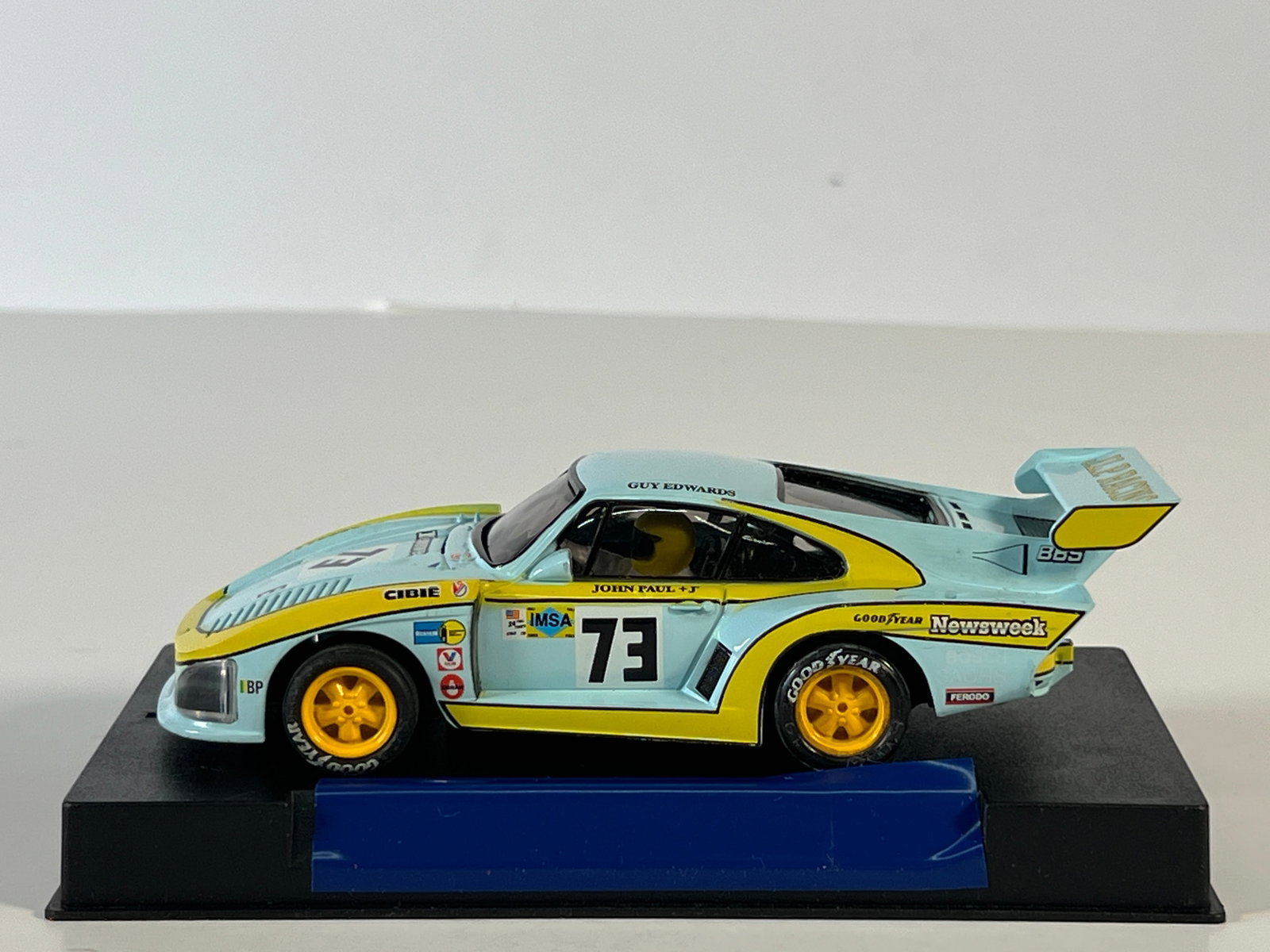 Porsche 935 JLP Racing #73 Newsweek: Porsche 935 JLP Racing #73 Newsweek 1/32 Slot Car. Weighs 7 oz.