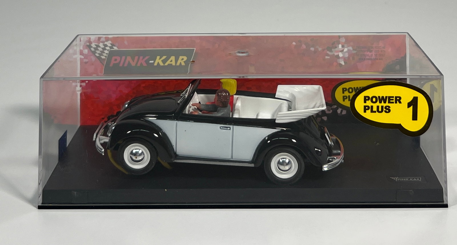 Pink-Kar VW Beetle Cabrio Negro: Pink-Kar VW Beetle Cabrio Negro 1/32 Slot Car. Reference #CV041, with original case. Dimensions: 2.75'' x 7.75''. Weight: 7oz.